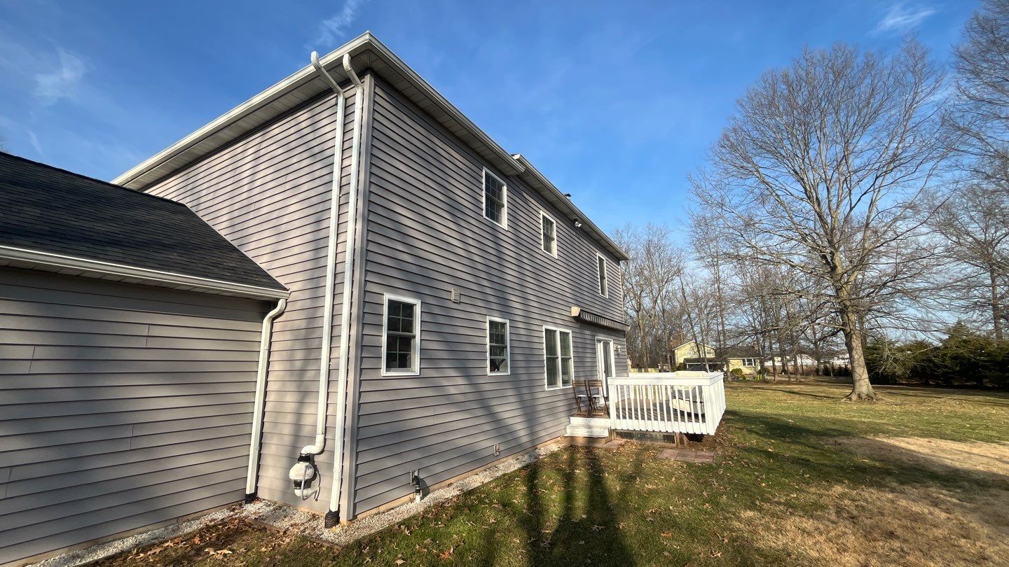 Showcasing clean, durable siding and careful exterior work, Mast Roofing & Construction helps protect and refresh your home with dependable craftsmanship.
