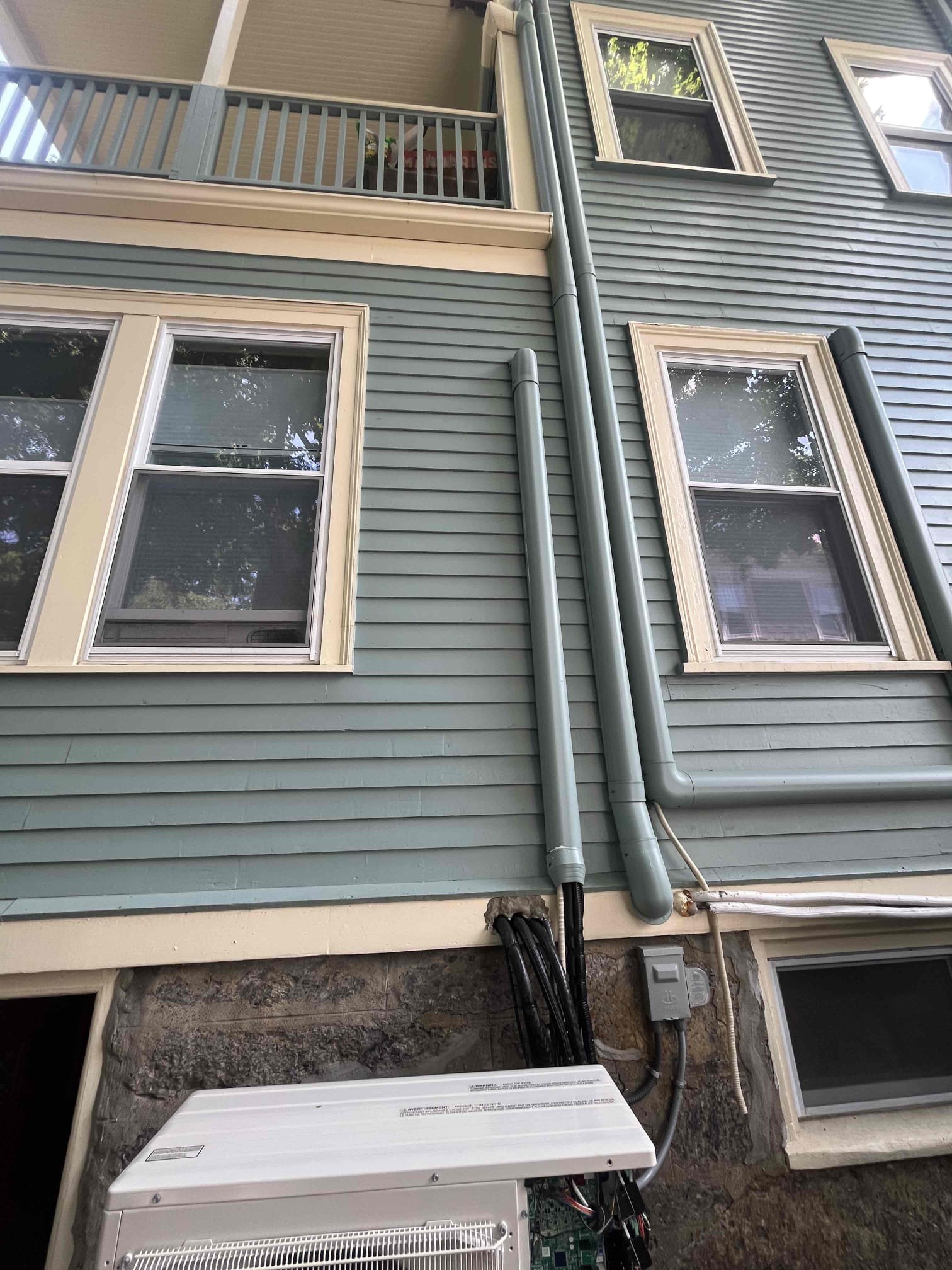 Akian Plumbing, Heating, Cooling & Electric shows careful exterior installations that blend with home aesthetics while delivering reliable HVAC and electrical service.