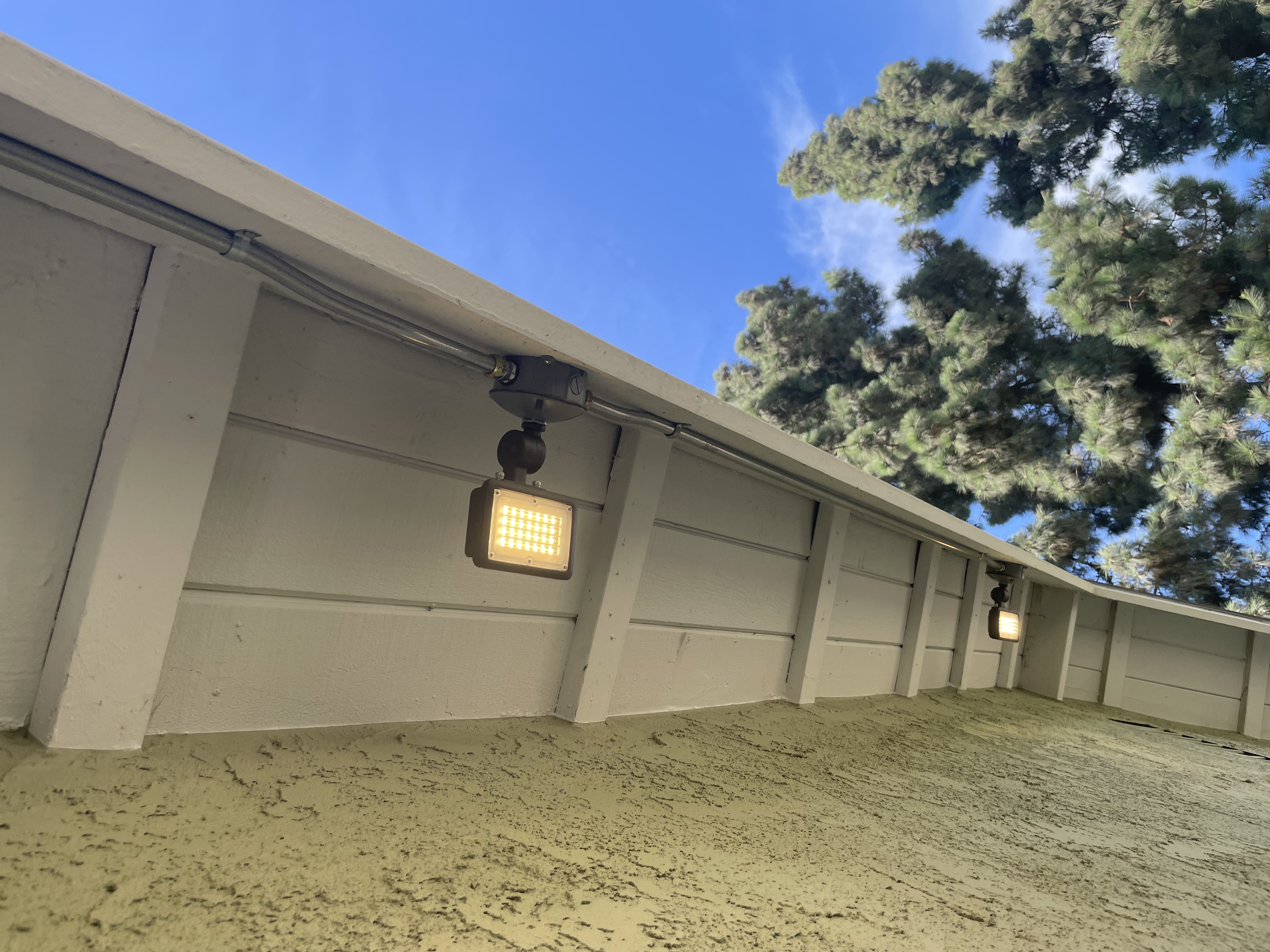 Powell Electric installed bright, reliable exterior LED lighting with tidy conduit routing to boost home safety and curb appeal.