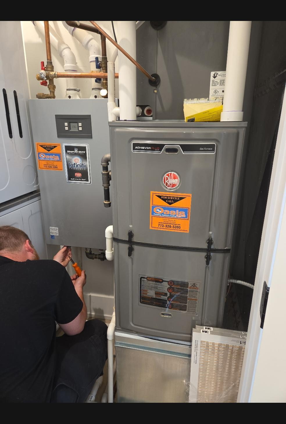 A skilled technician ensures reliable heating and clean air, reflecting the dependable service customers expect from Oasis Heating and Cooling.
