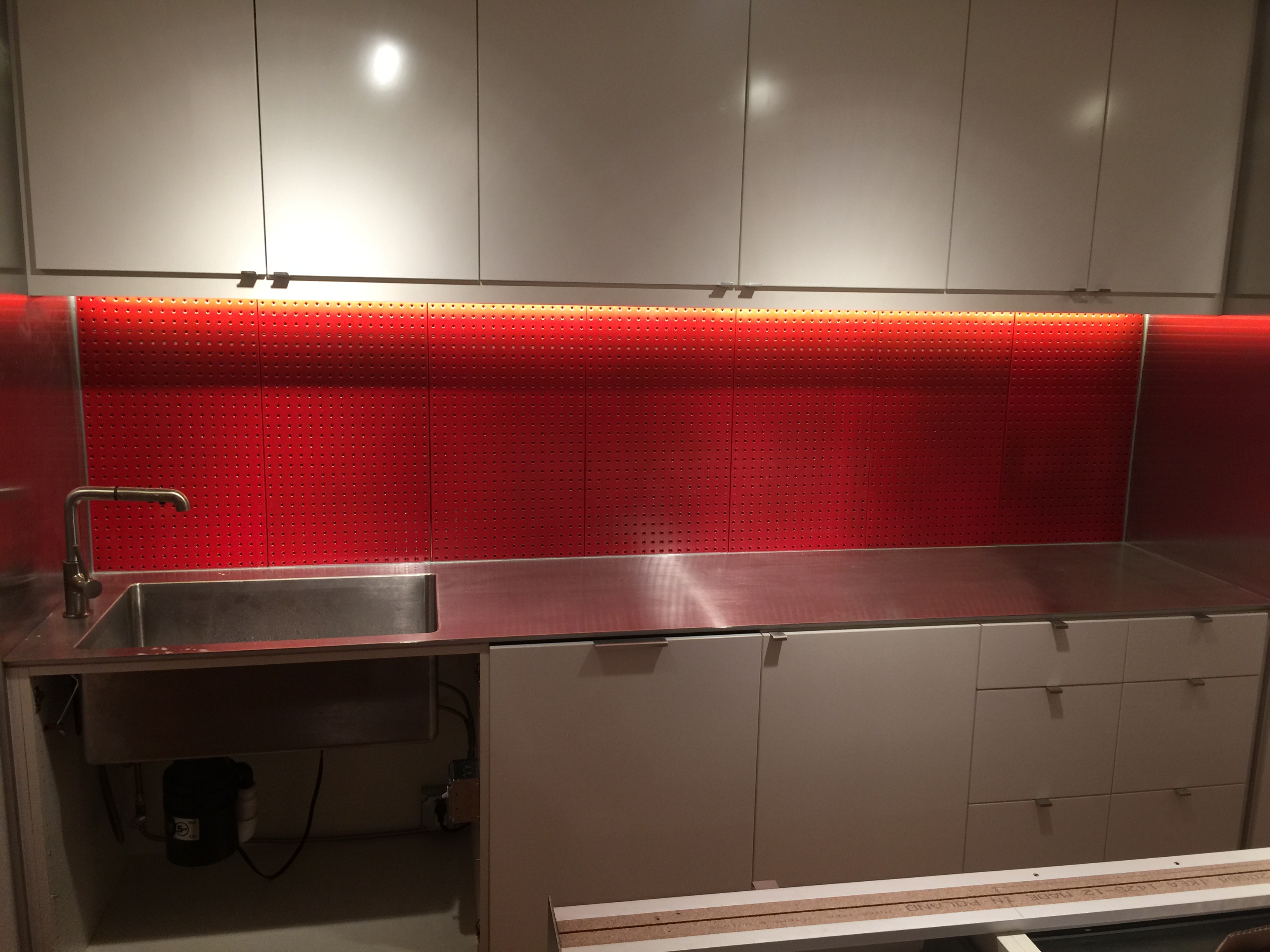 Illuminate your kitchen with modern electrical solutions by Castle Electric Inc., professionals in creating efficient and elegant spaces.