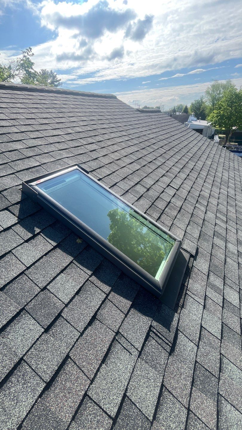 Showcasing dependable roof craftsmanship and a well-sealed skylight, Mast Roofing & Construction delivers durable results homeowners can trust.