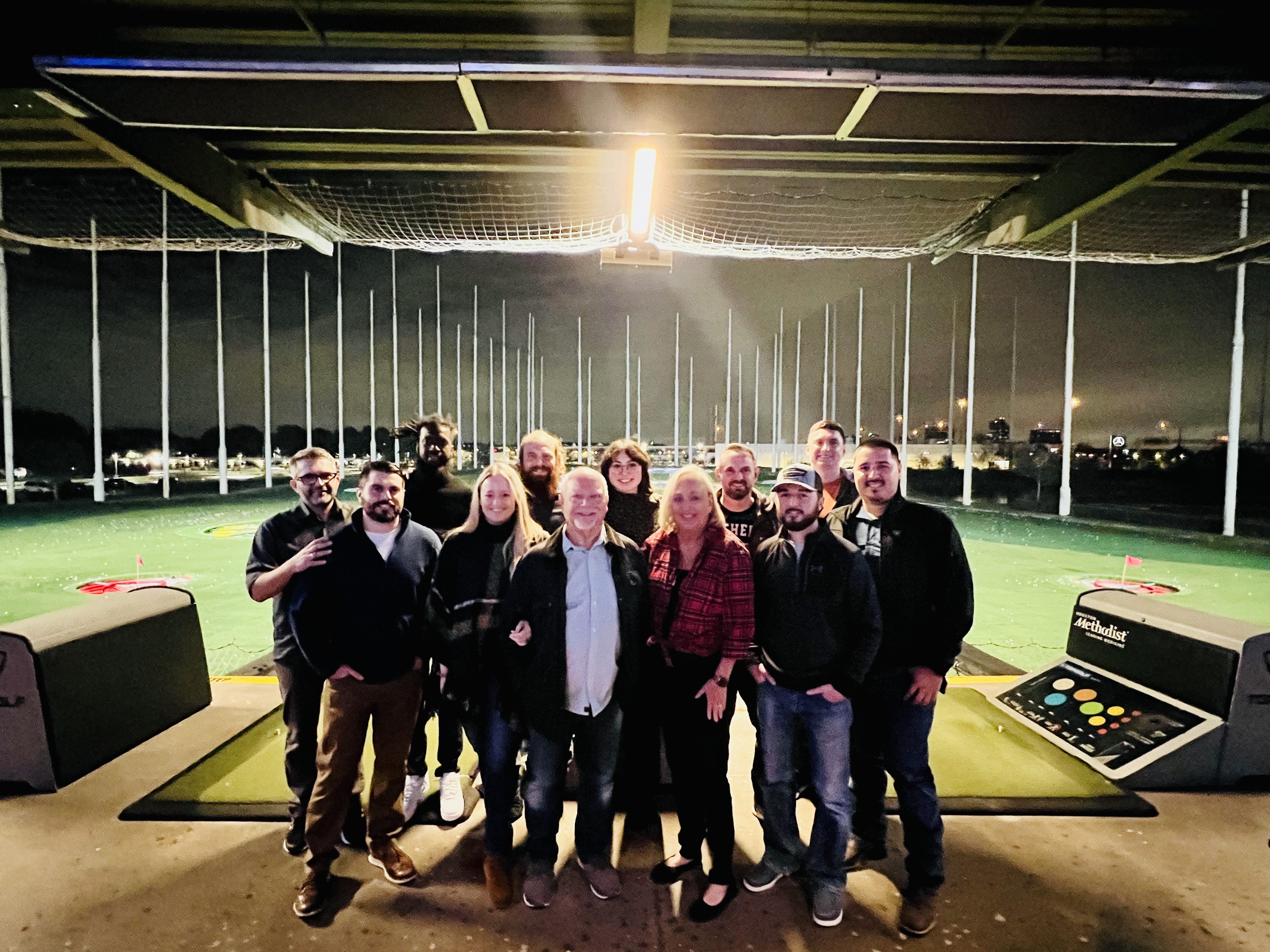 A lively team night out showcases the camaraderie and strong company culture at West Houston Electric, Inc., building trust with customers.