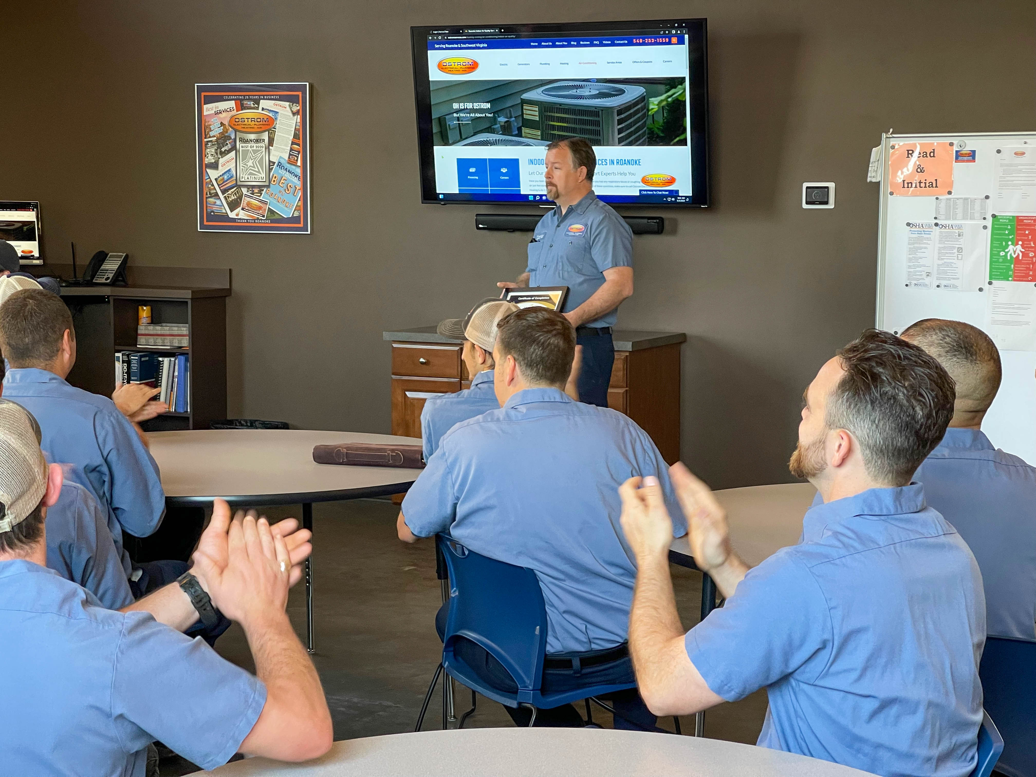 Celebrating excellence and teamwork at Ostrom Electrical Plumbing Heating & Air Conditioning.