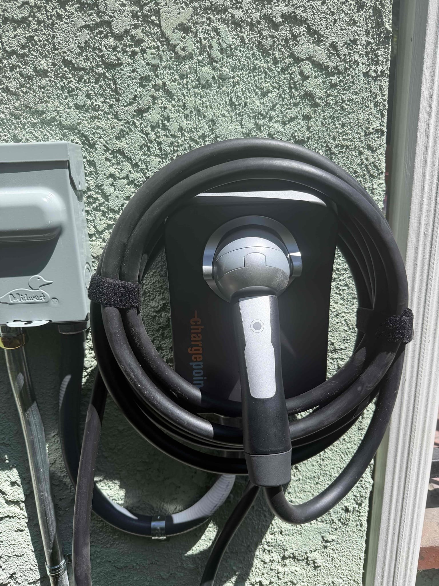 Powell Electric installed a clean, durable EV charging station with organized cable storage to make charging simple and reliable.