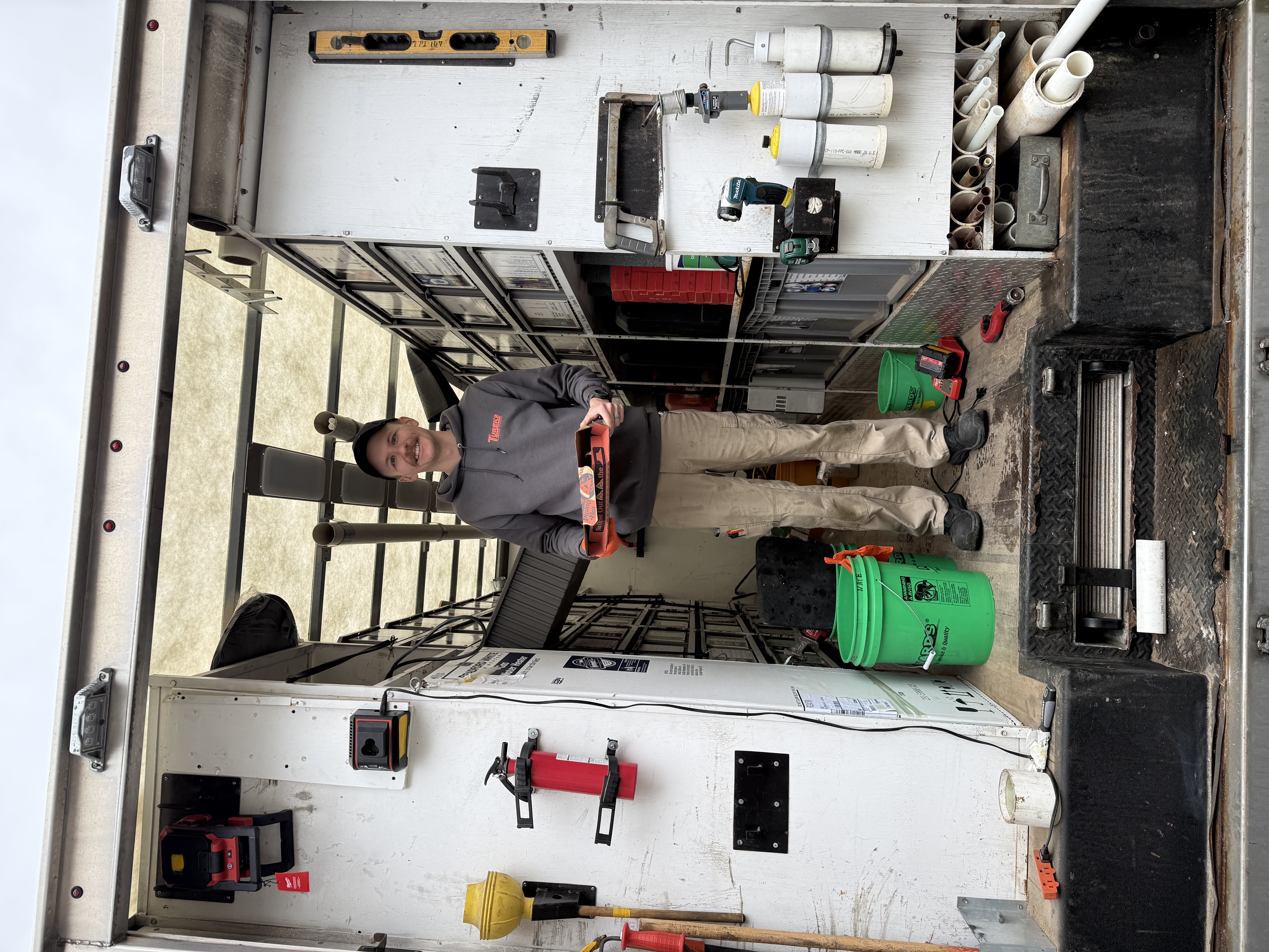 A friendly Tureks Plumbing Services technician arrives prepared and organized to deliver reliable, professional plumbing care on site.