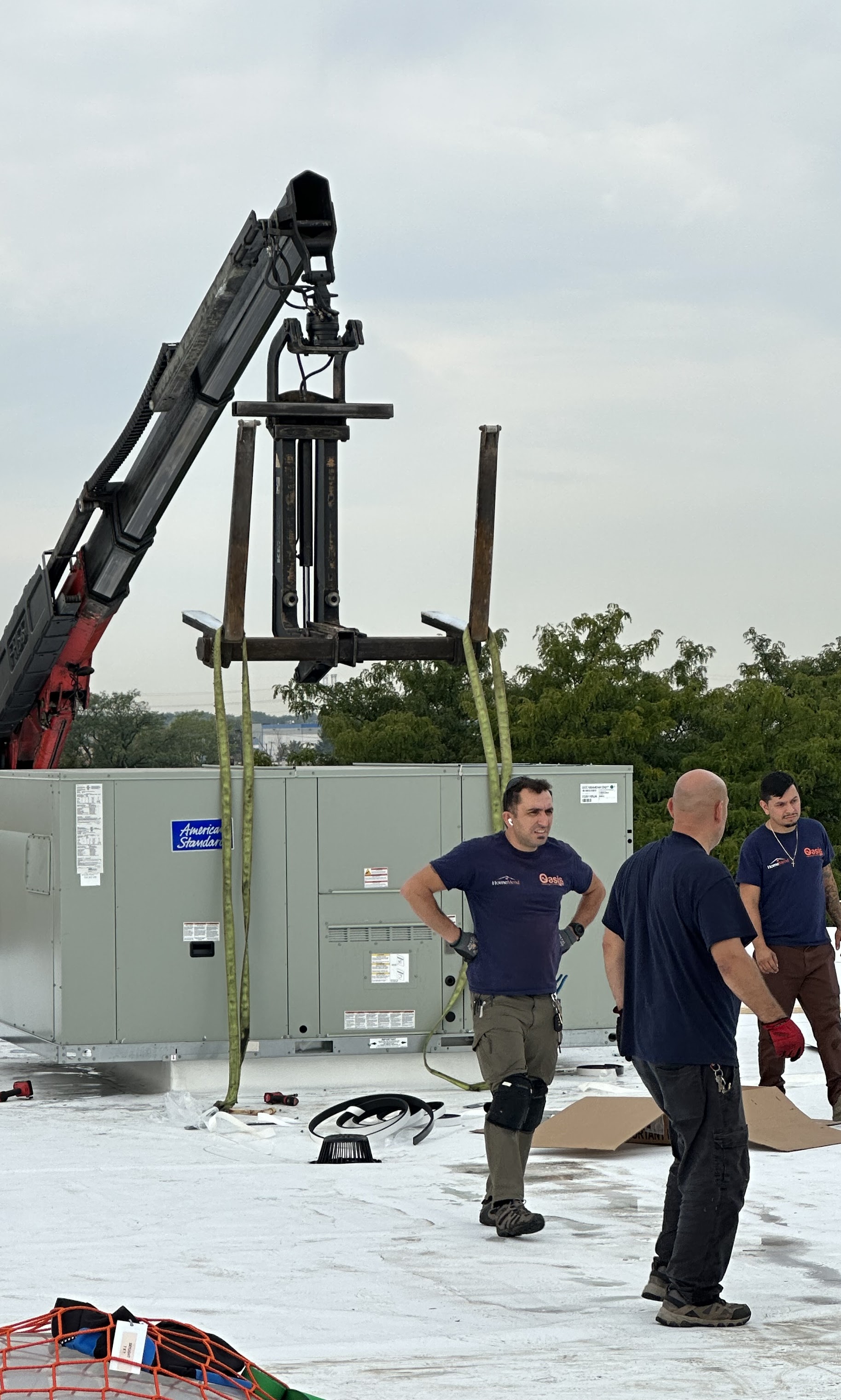 Our crew at Oasis Heating and Cooling delivers dependable rooftop HVAC installs with careful crane handling and experienced technicians on site.