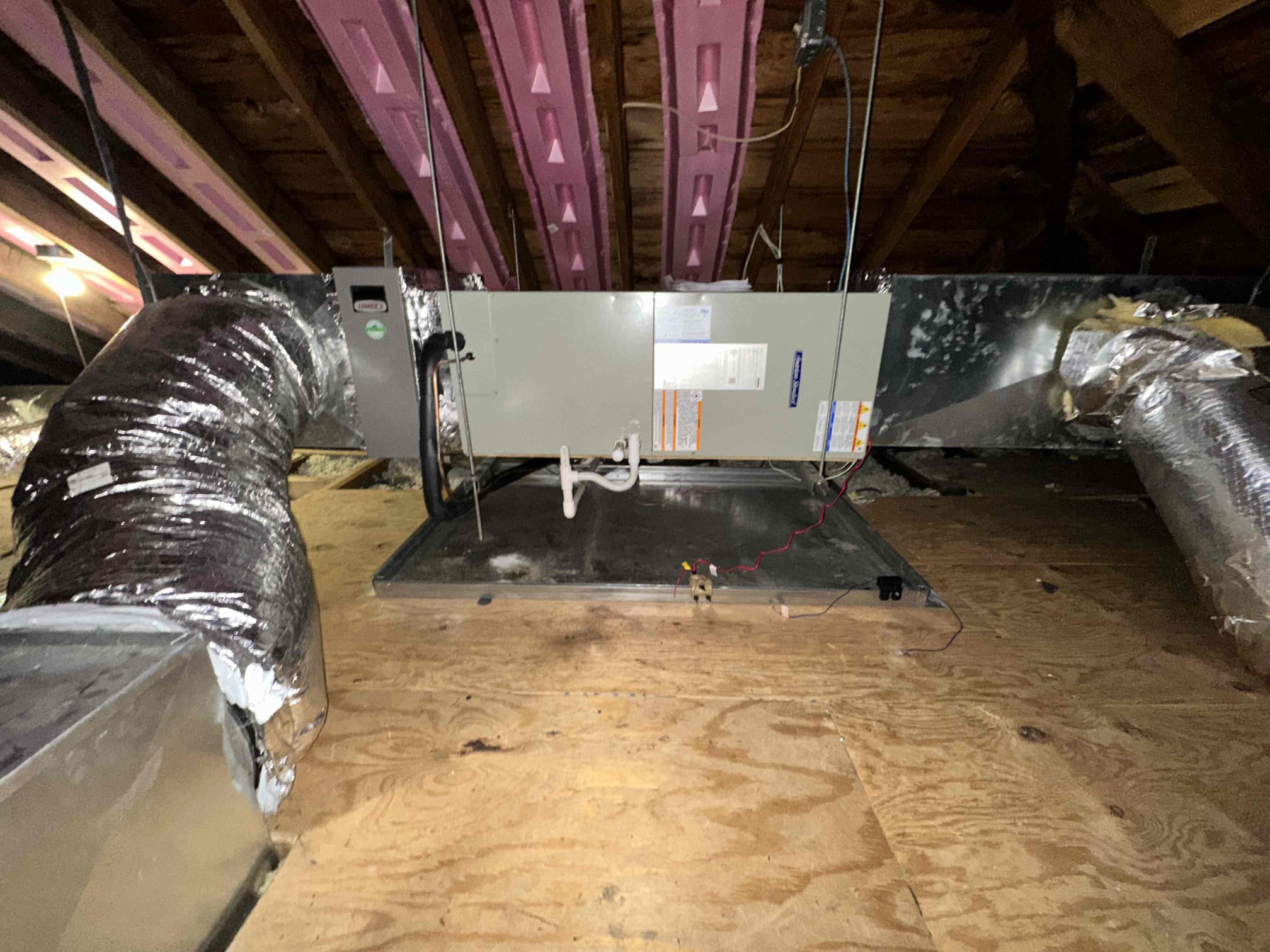 Akian Plumbing, Heating, Cooling & Electric shows careful attic HVAC installation and accessible service access for reliable, efficient home comfort.