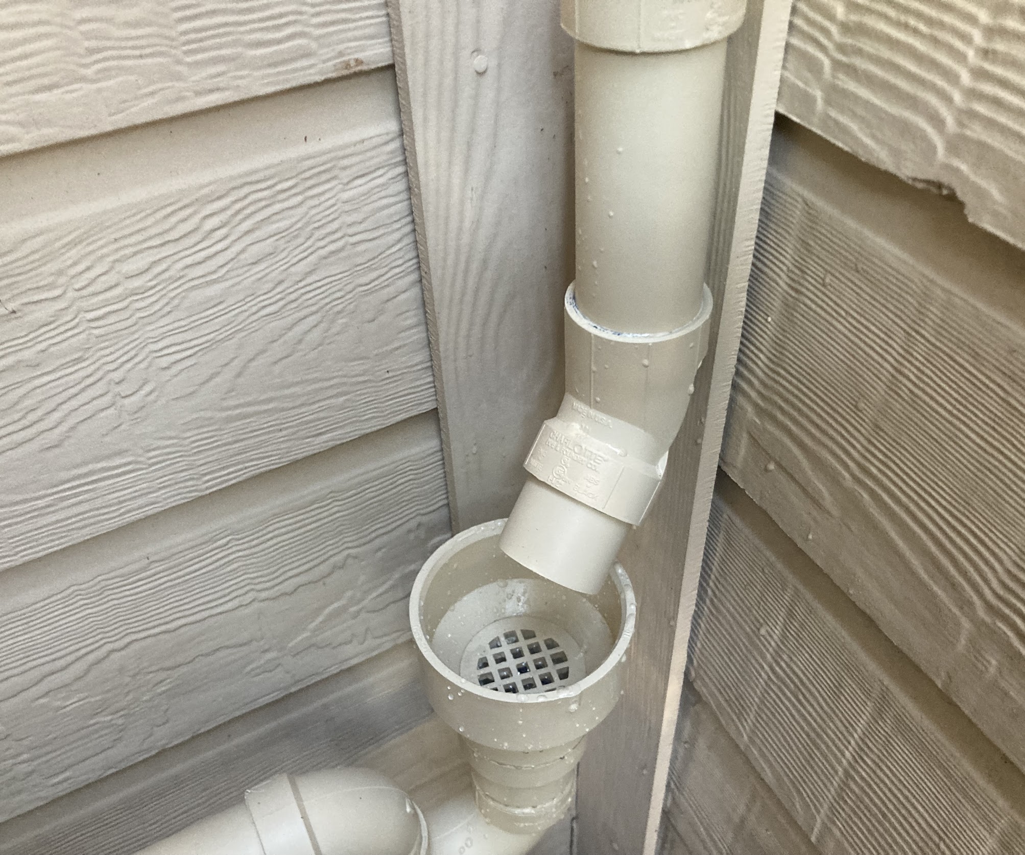 Reliable exterior drainage and clean installation highlight Abacus Plumbing, Air Conditioning & Electrical commitment to durable, professional work.
