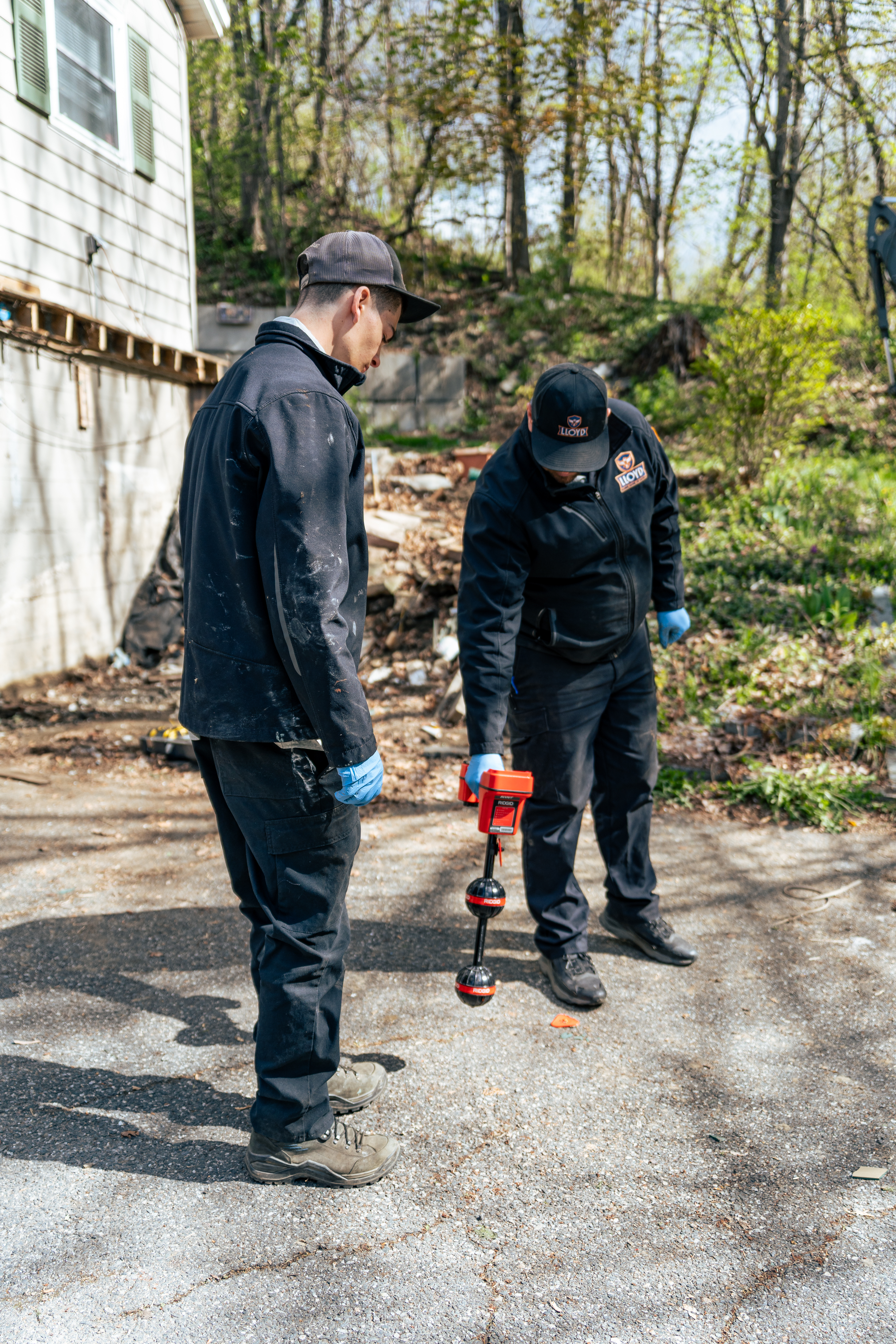 Skilled technicians from Lloyd Plumbing, Heating, Air, Electrical arrive prepared and professional, demonstrating careful, safety-minded workmanship on site.