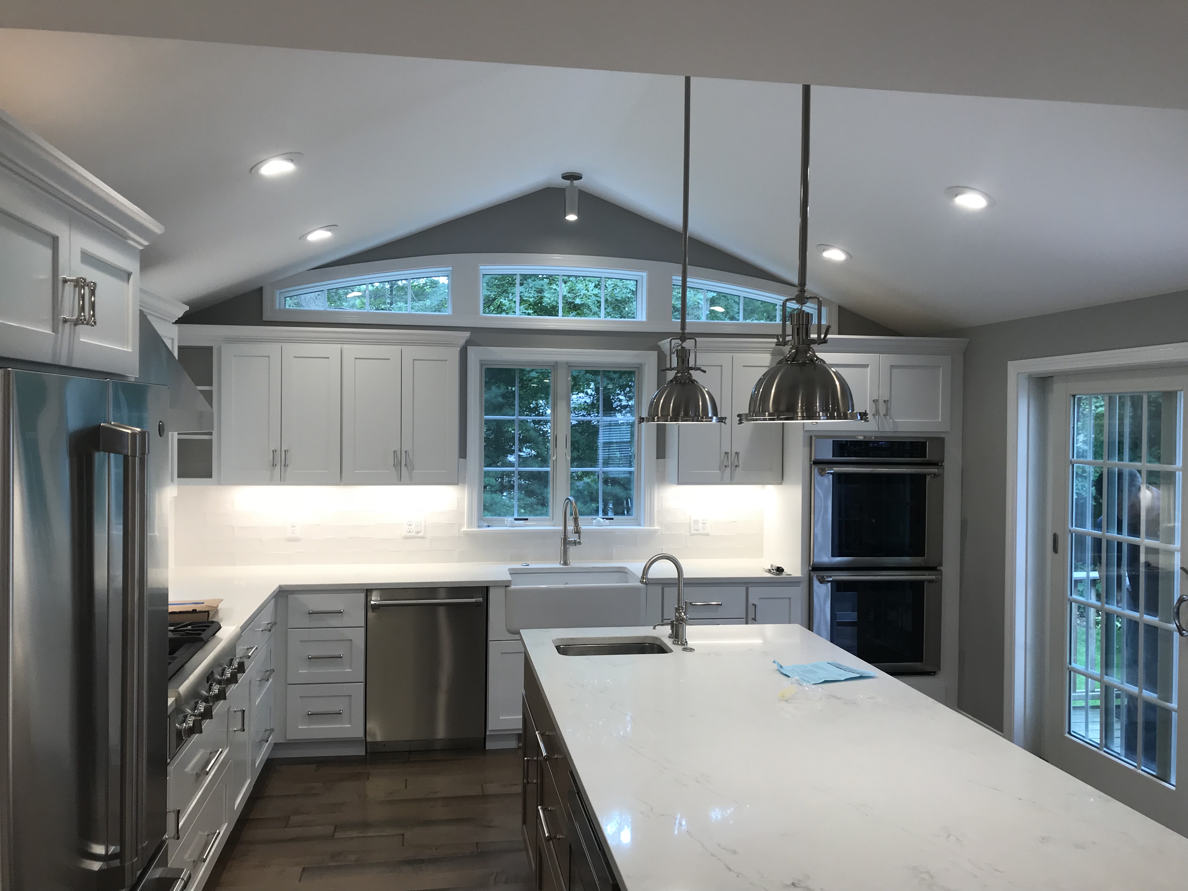 Experience the elegance and precision of Castle Electric Inc.'s modern kitchen designs, where quality meets innovation.