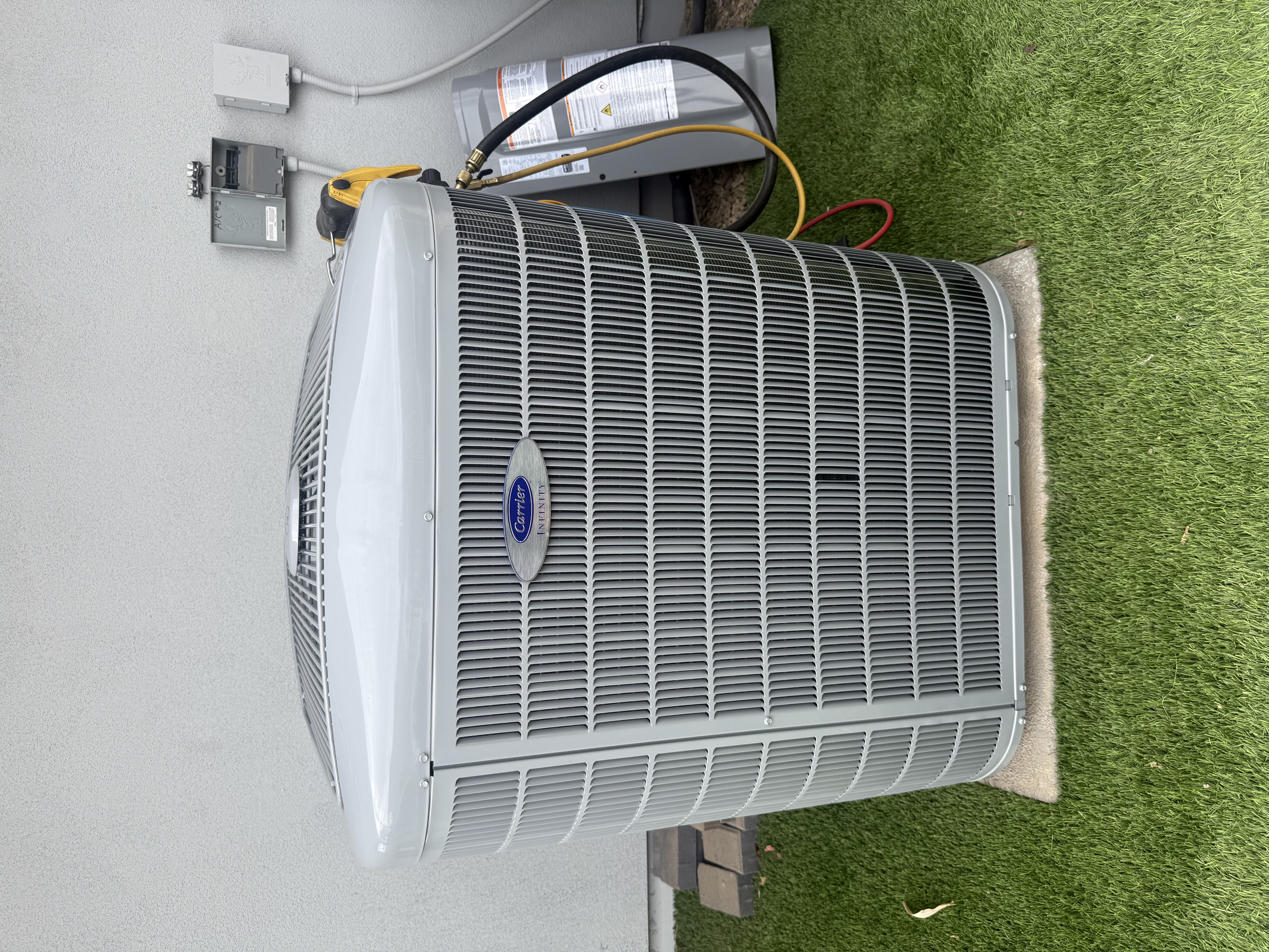 A clean Carrier Infinity installation shows Western States Home Services' commitment to durable, professional HVAC workmanship.