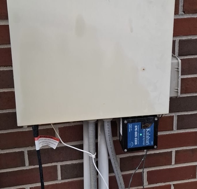 Professional exterior electrical work by Kalahari Electrical Services highlights tidy conduit routing and durable installation for long-lasting safety and reliability.