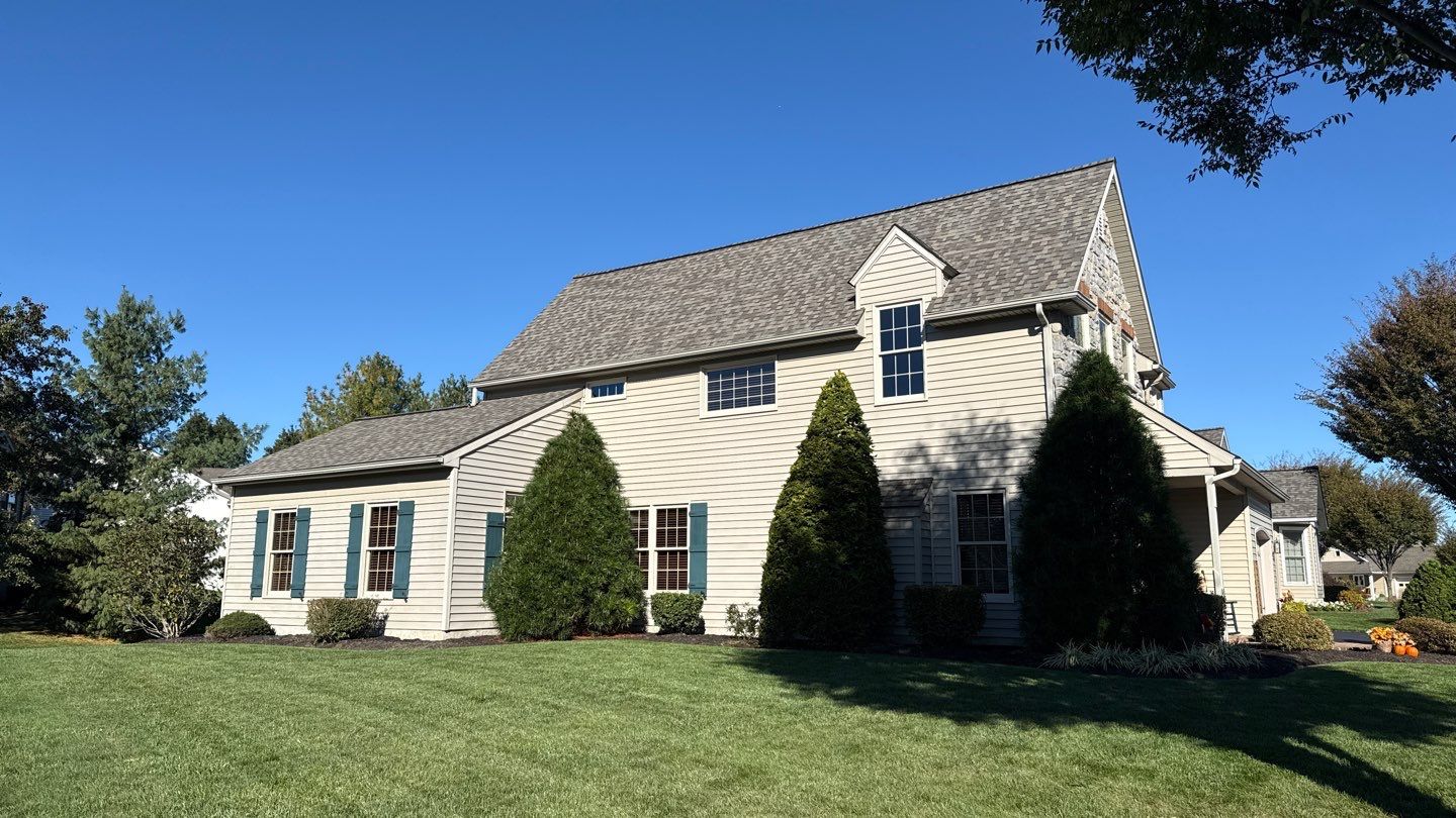 Confident craftsmanship and lasting durability are visible on this home roof, showcased by Mosaic Roofing & Exteriors with pride.
