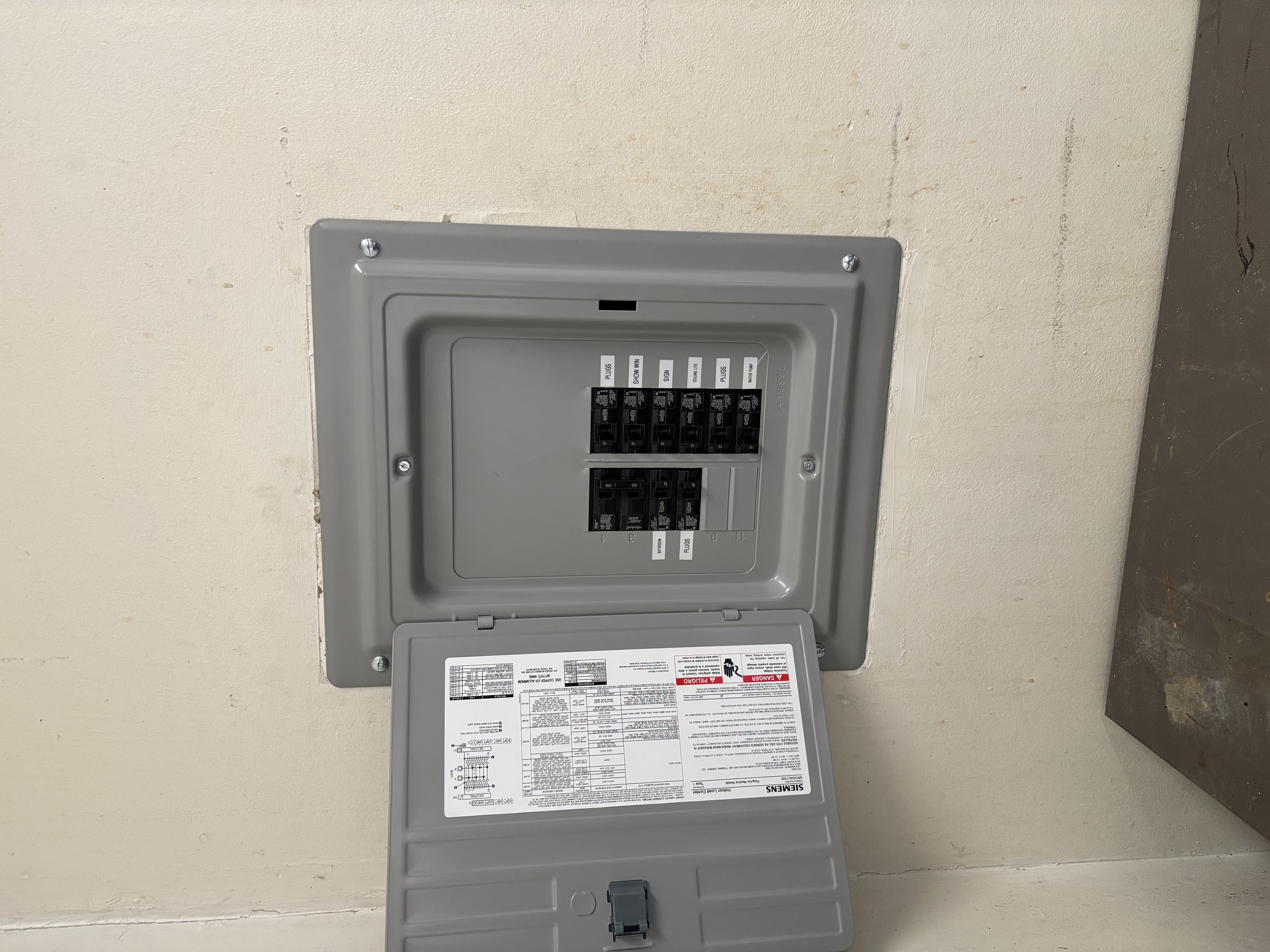 Powell Electric demonstrates careful, professional panel work with clear labeling and neat installation for reliable home safety.