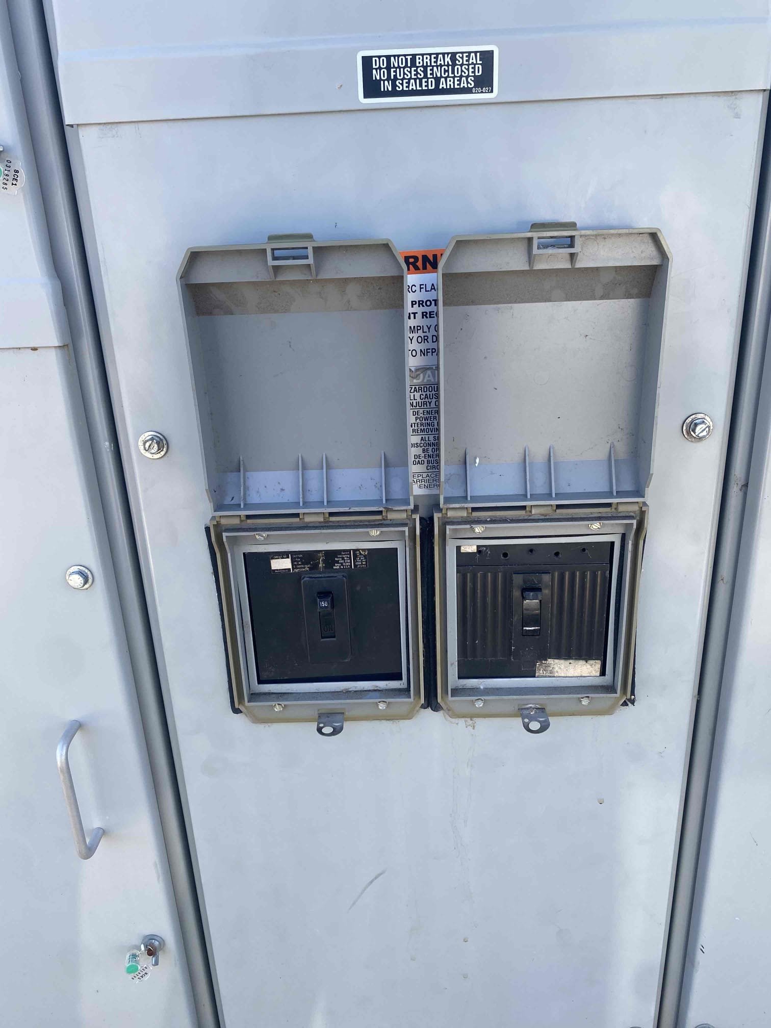Powell Electric demonstrates reliable electrical panel care and safety-first service with neatly maintained breaker access covers.
