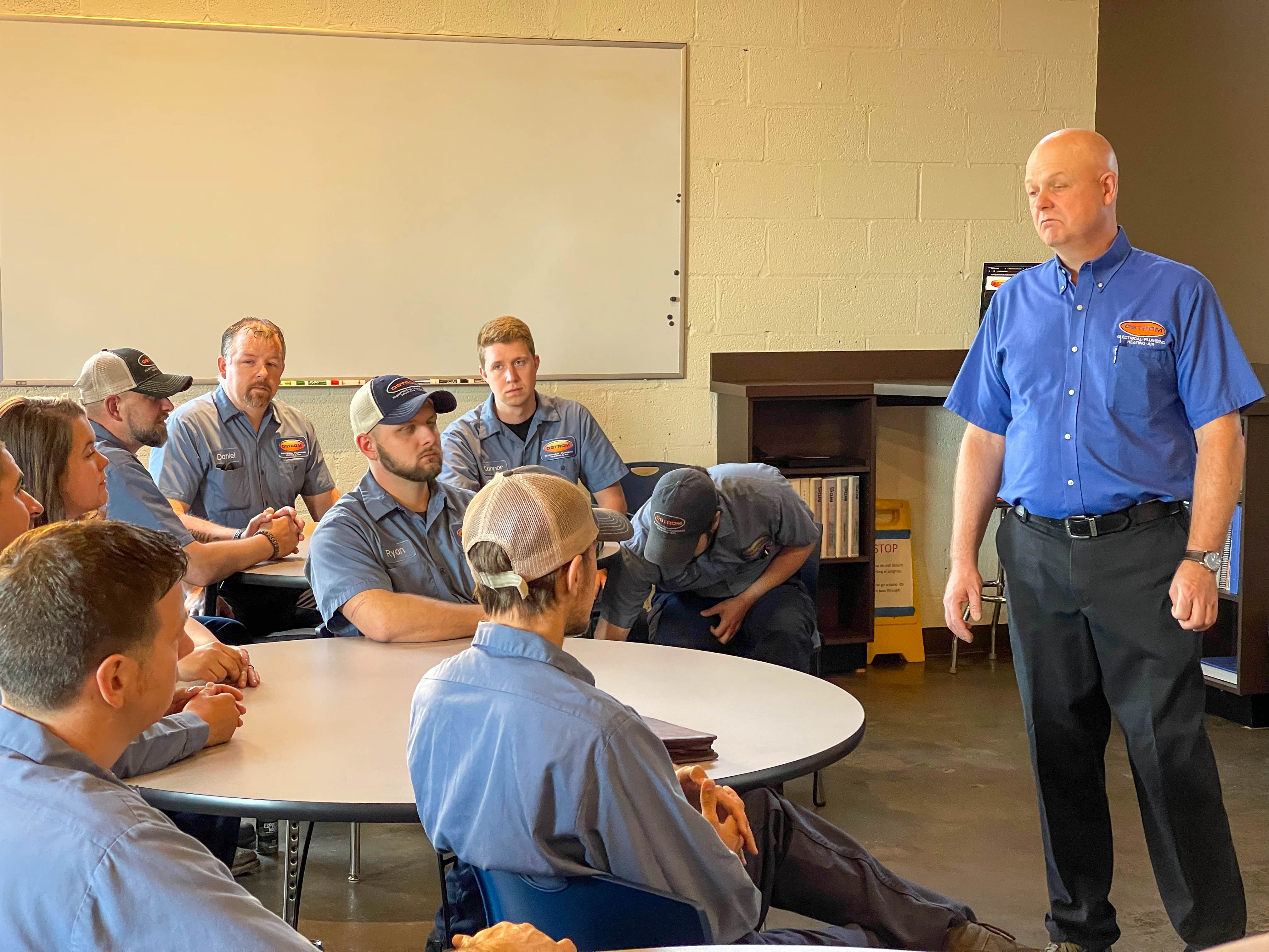 Ostrom Electrical Plumbing Heating & Air Conditioning exemplifies professionalism and teamwork in every meeting, ensuring top-notch services for our valued customers.