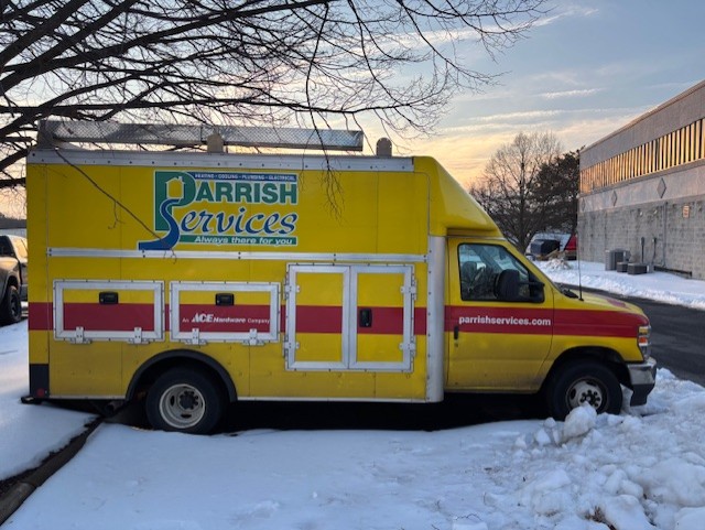 A well-branded Parrish Services truck ready for winter service shows the dependable professionalism customers can count on.