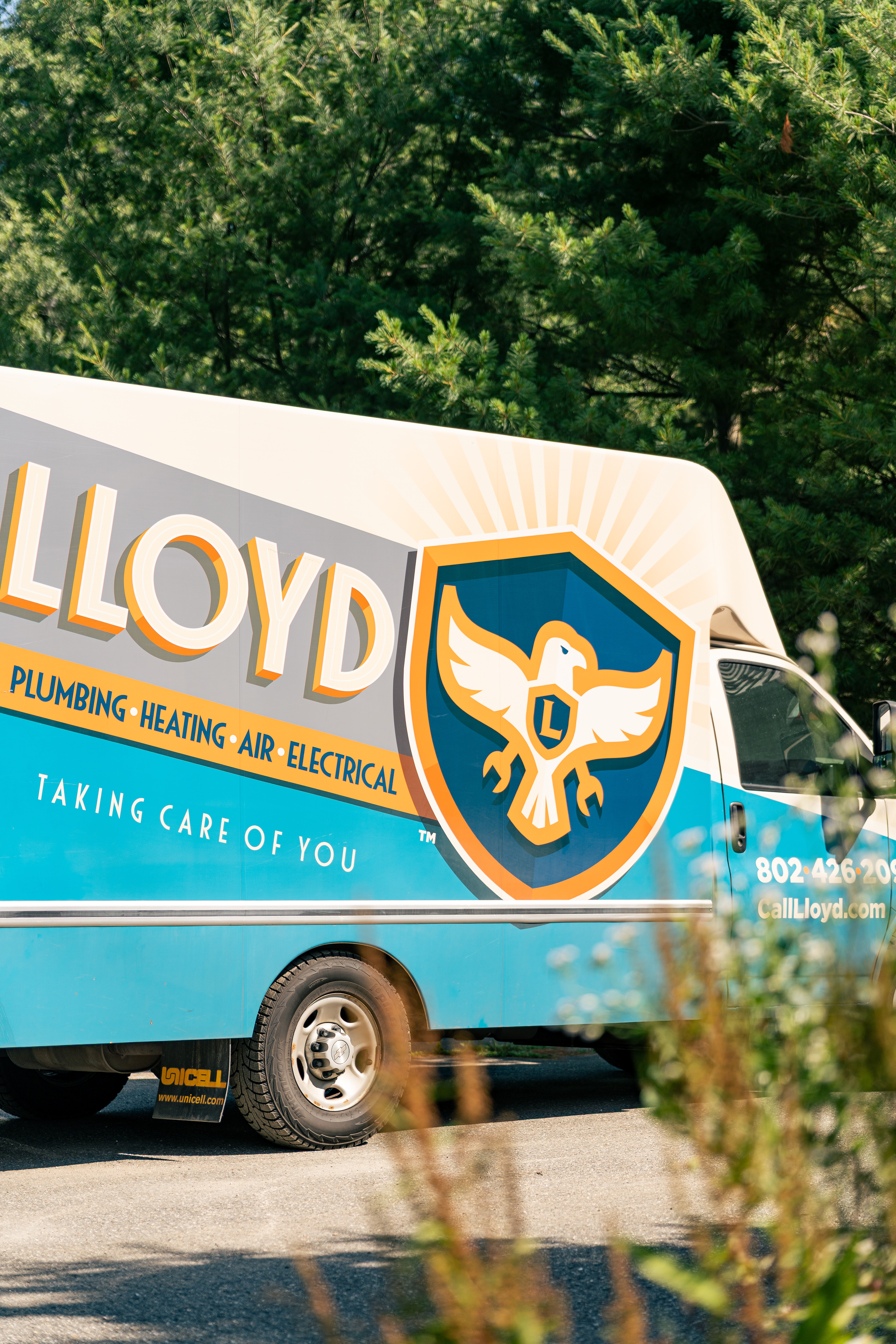 A well-branded service van parked on site highlights Lloyd Plumbing, Heating, Air, Electrical's dependable professionalism and visible local presence.