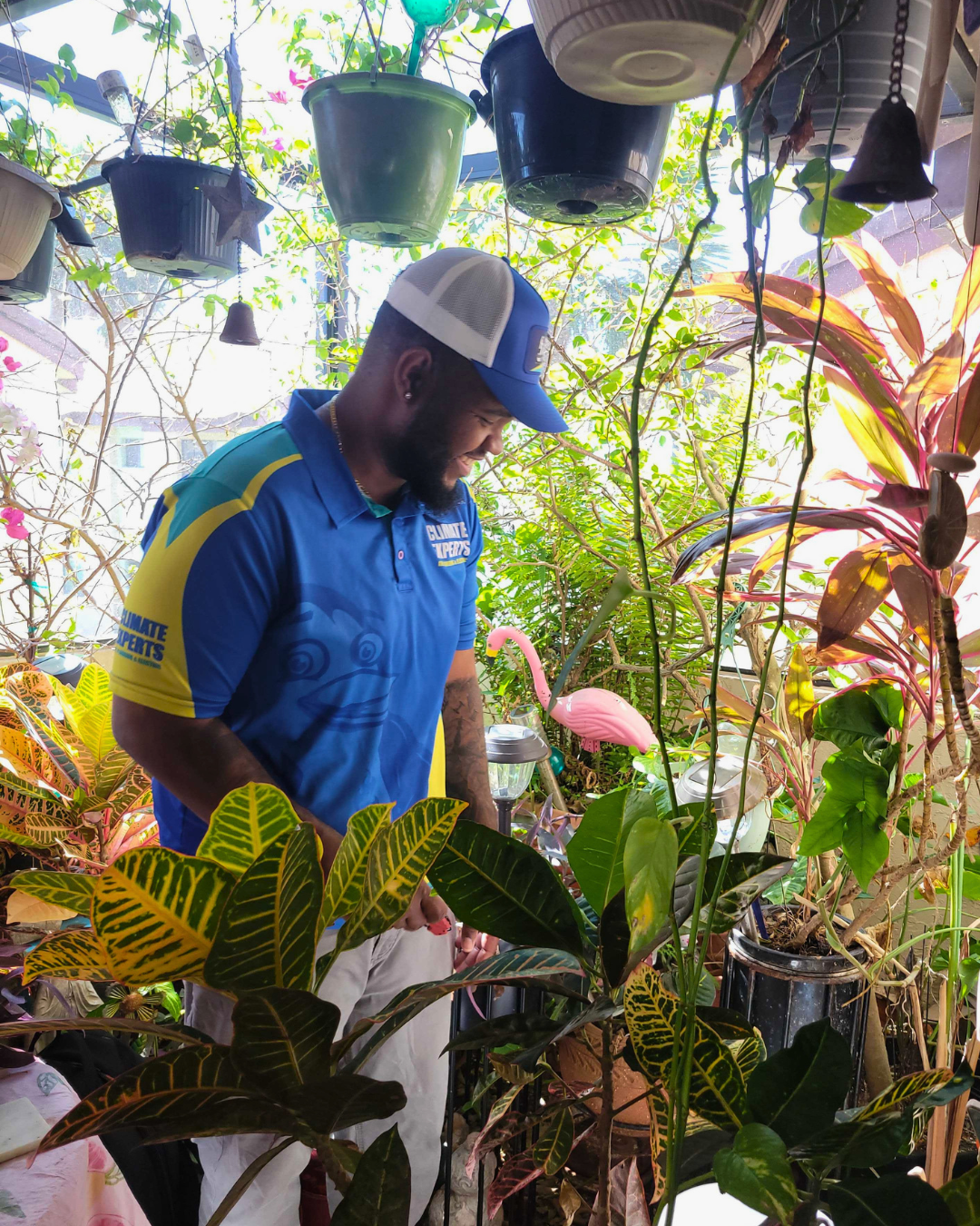 Friendly and professional service from Climate Experts Air, Plumbing & Electric shows care for your home and plants while completing the job.