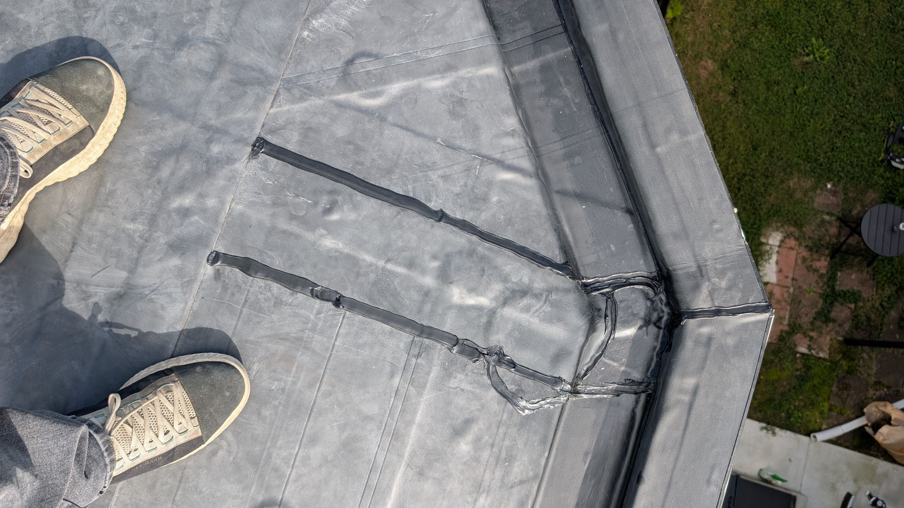Skilled seam repairs and careful detailing on a flat roof highlight Mosaic Roofing & Exteriors' commitment to durable, reliable workmanship.