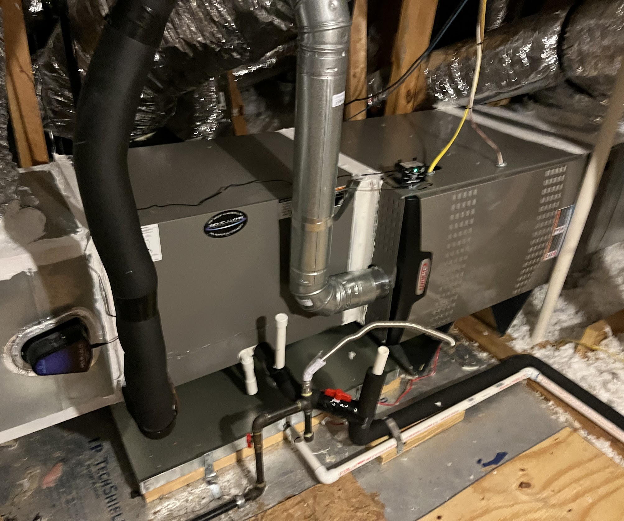 Clean, professional HVAC installation in the attic shows the care and reliability customers expect from Abacus Plumbing, Air Conditioning & Electrical.