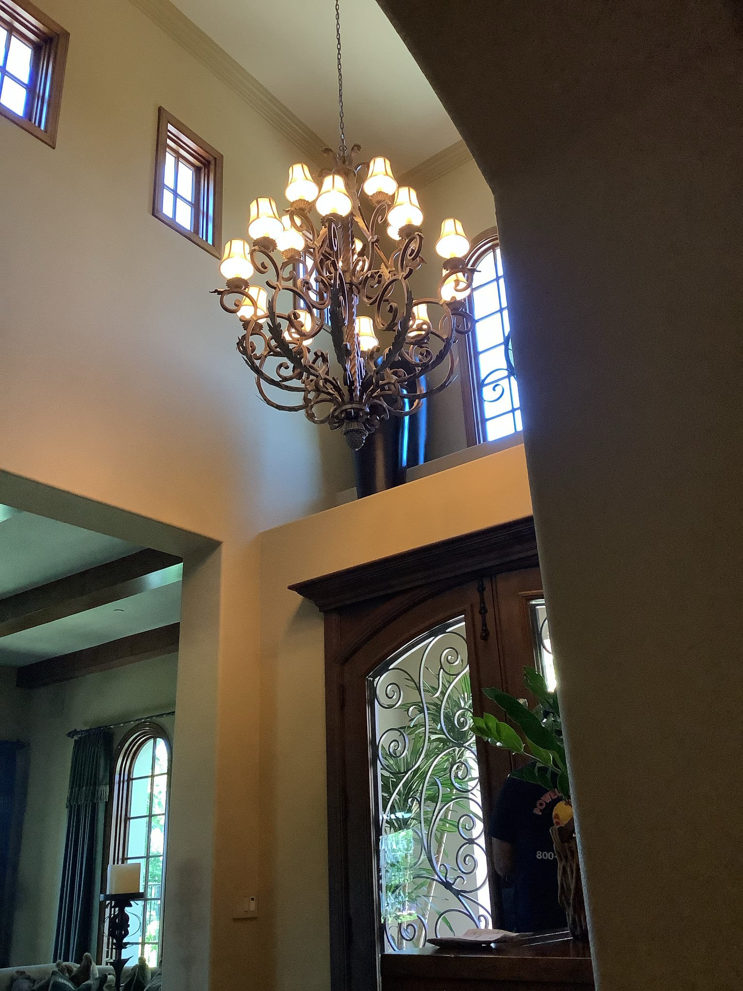 Impressive craftsmanship lights the entryway, showcasing Powell Electric’s attention to detail and reliable lighting installations.