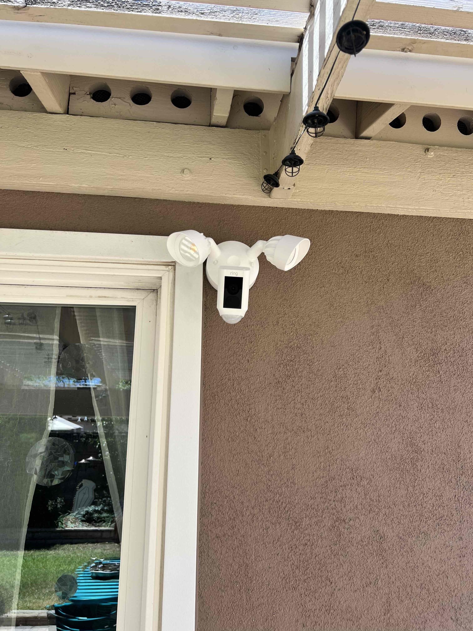 Powell Electric installed a clean, secure floodlight camera to boost home safety and present a polished exterior.