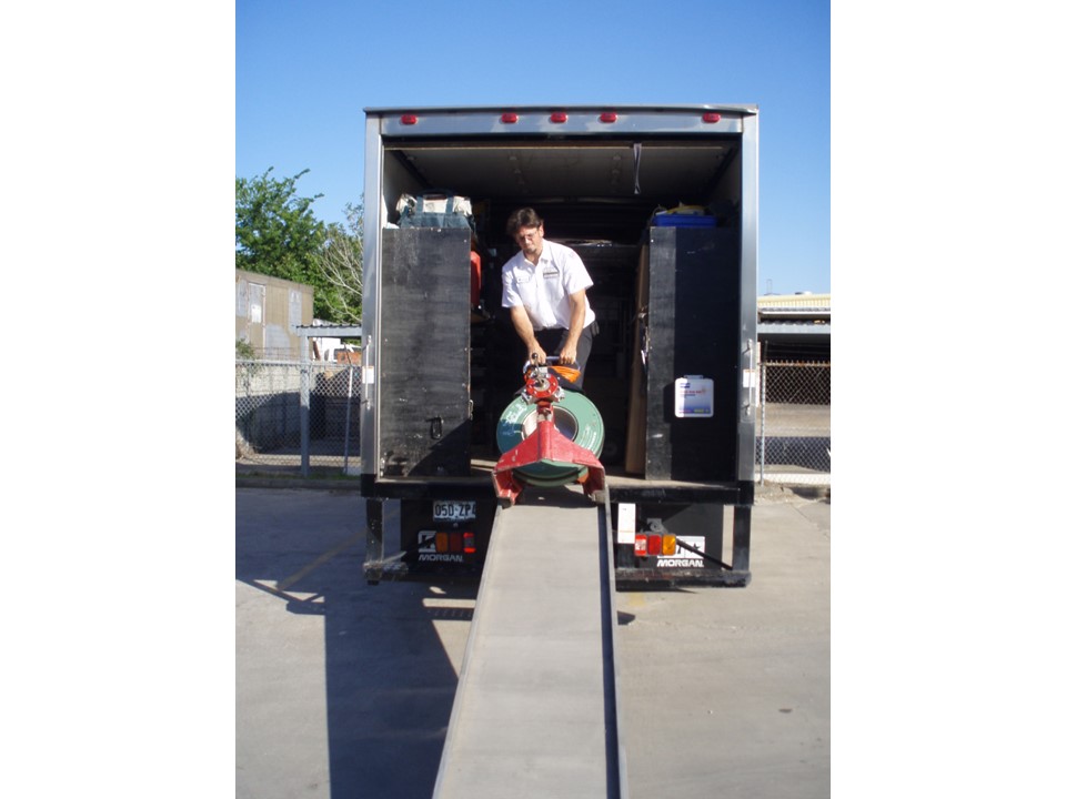 A skilled technician from Abacus Plumbing, Air Conditioning & Electrical demonstrates safe, efficient handling of equipment for dependable service every time.