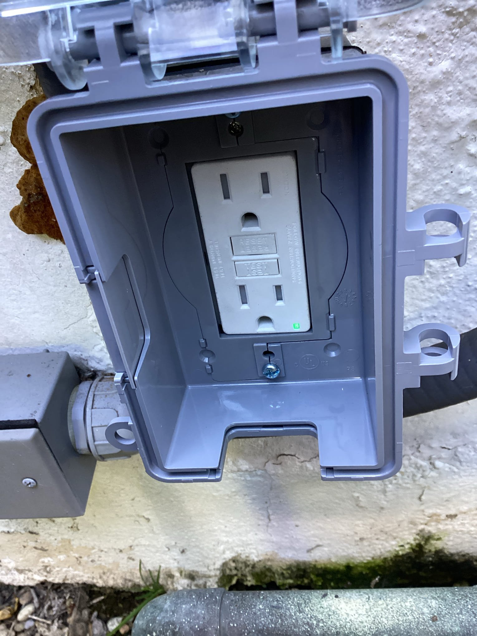 Powell Electric installed a weatherproof GFCI outlet to keep outdoor circuits safe and reliable for your home.