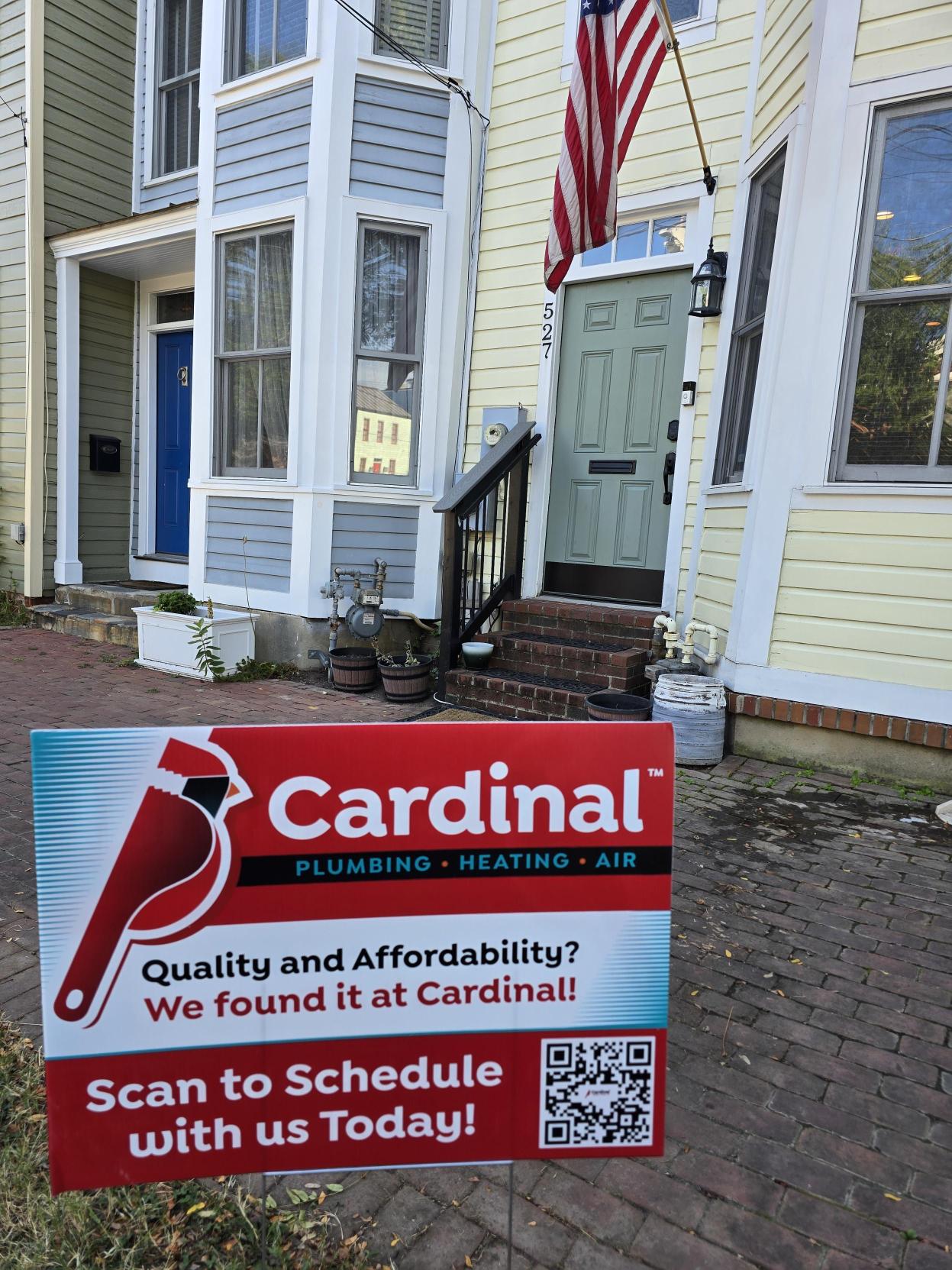 Showcasing dependable service and neighborhood trust, Cardinal Plumbing Heating & Air makes scheduling simple with visible local signage.