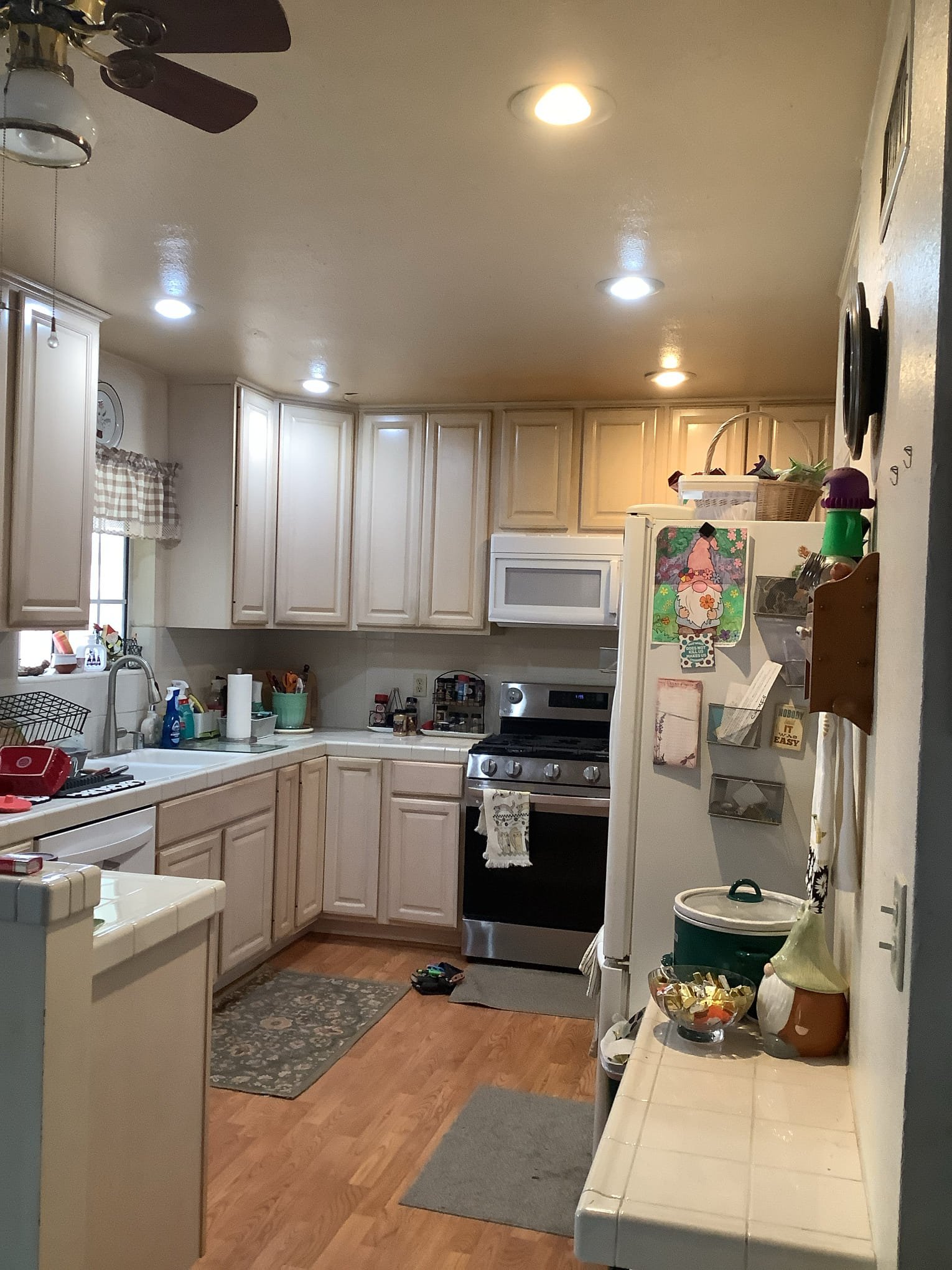 Powell Electric updated this kitchen with clean, evenly placed recessed lighting to brighten the space and showcase careful craftsmanship.