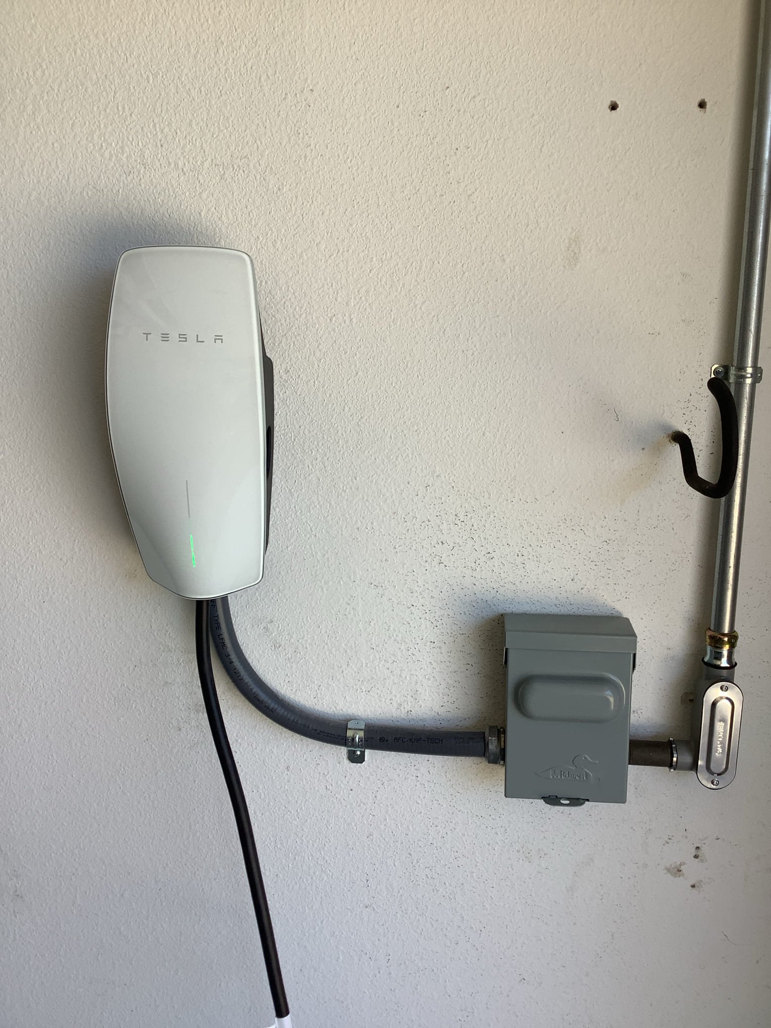 Powell Electric installed a clean, professional Tesla charger setup that enhances home convenience and long-term value.