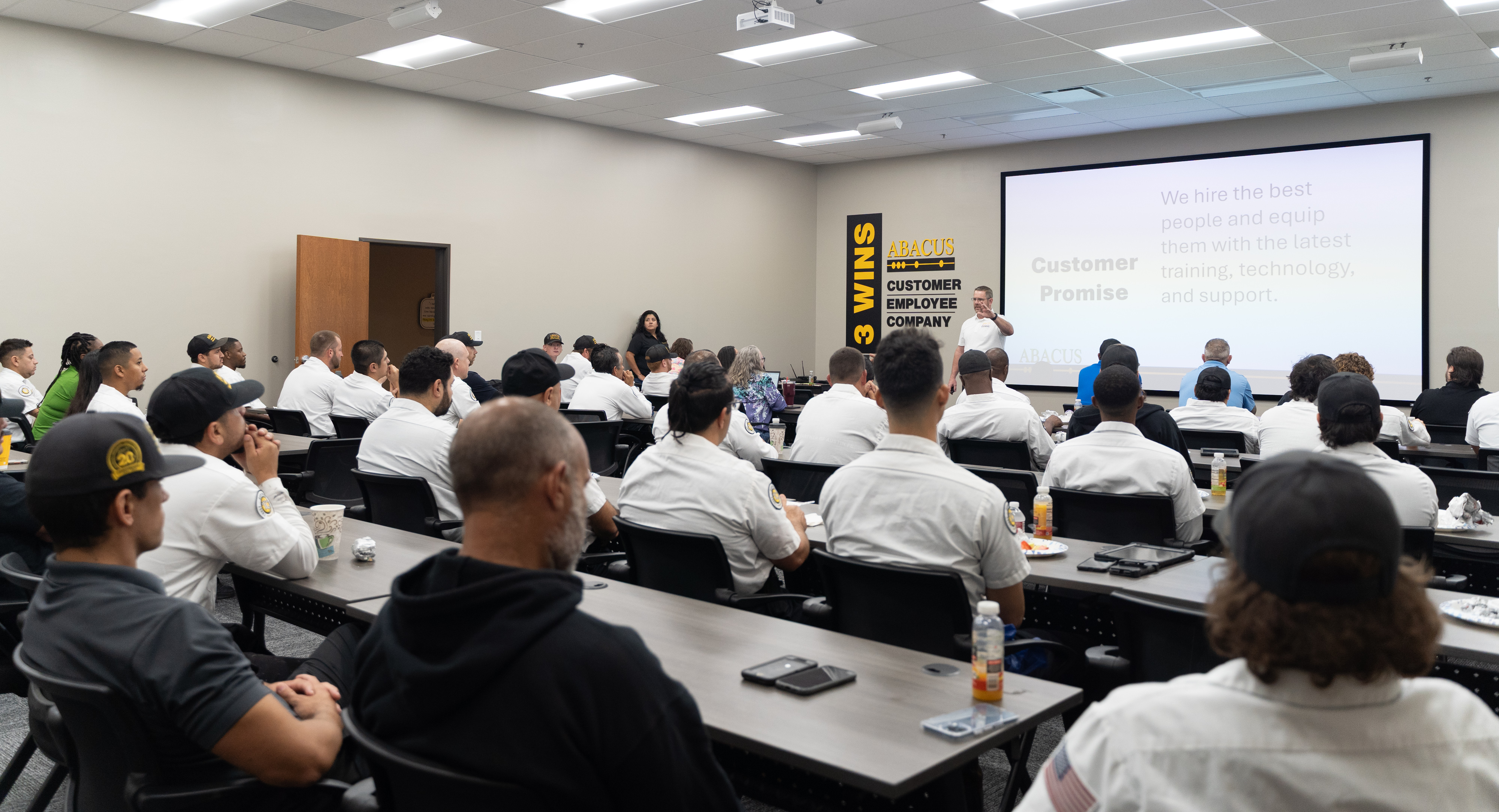 Abacus Plumbing, Air Conditioning, & Electrical demonstrates commitment to skilled, customer-focused teams through regular hands-on training and clear standards.