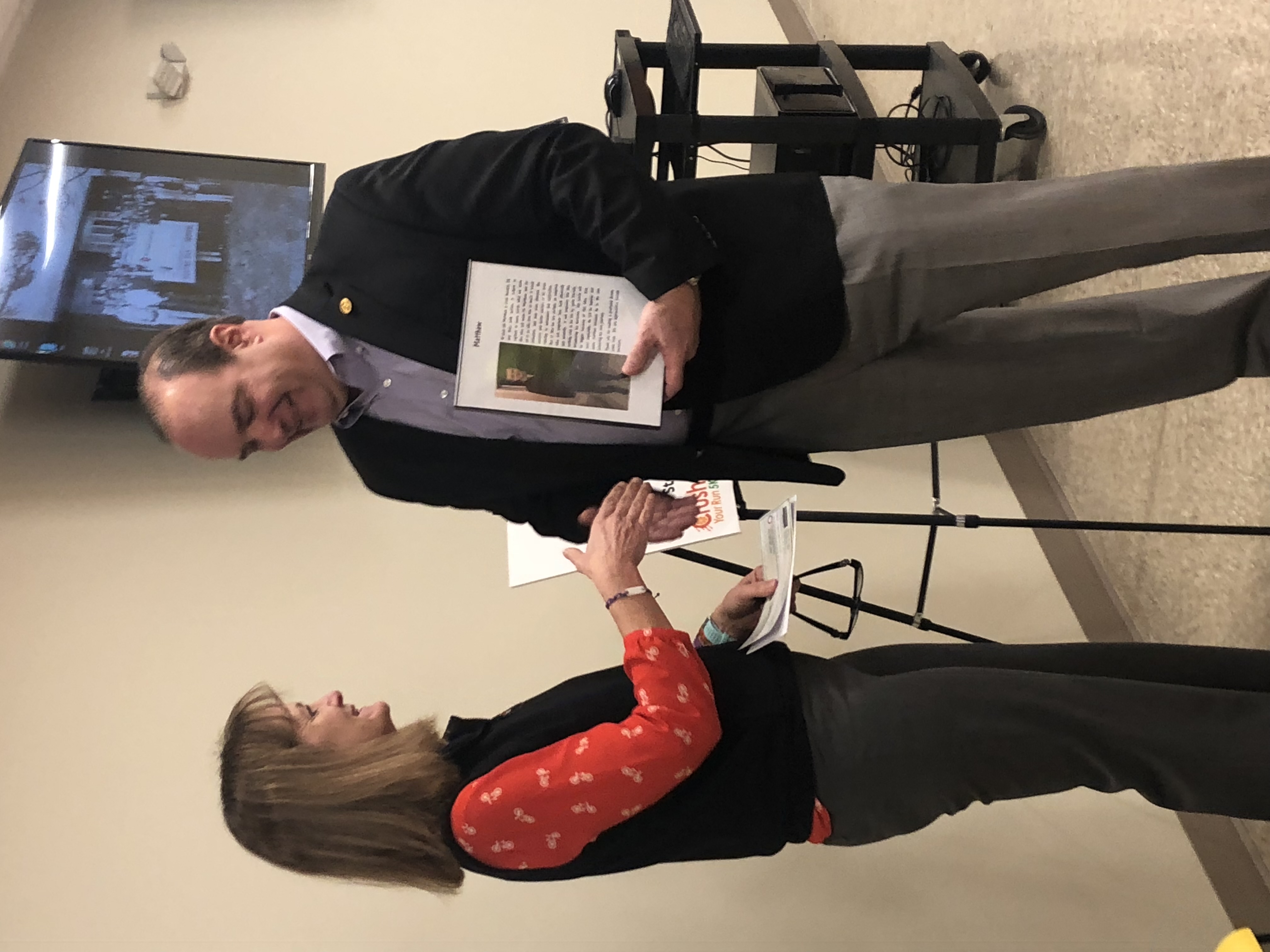 Boulden Brothers celebrates exceptional service with a handshake and recognition of achievements.