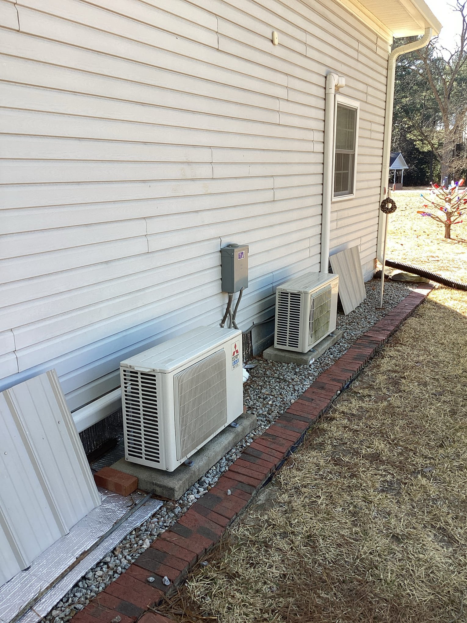 Cleanly installed outdoor mini-split units showcase Dawson's Electric & Air commitment to reliable, professional HVAC installations.