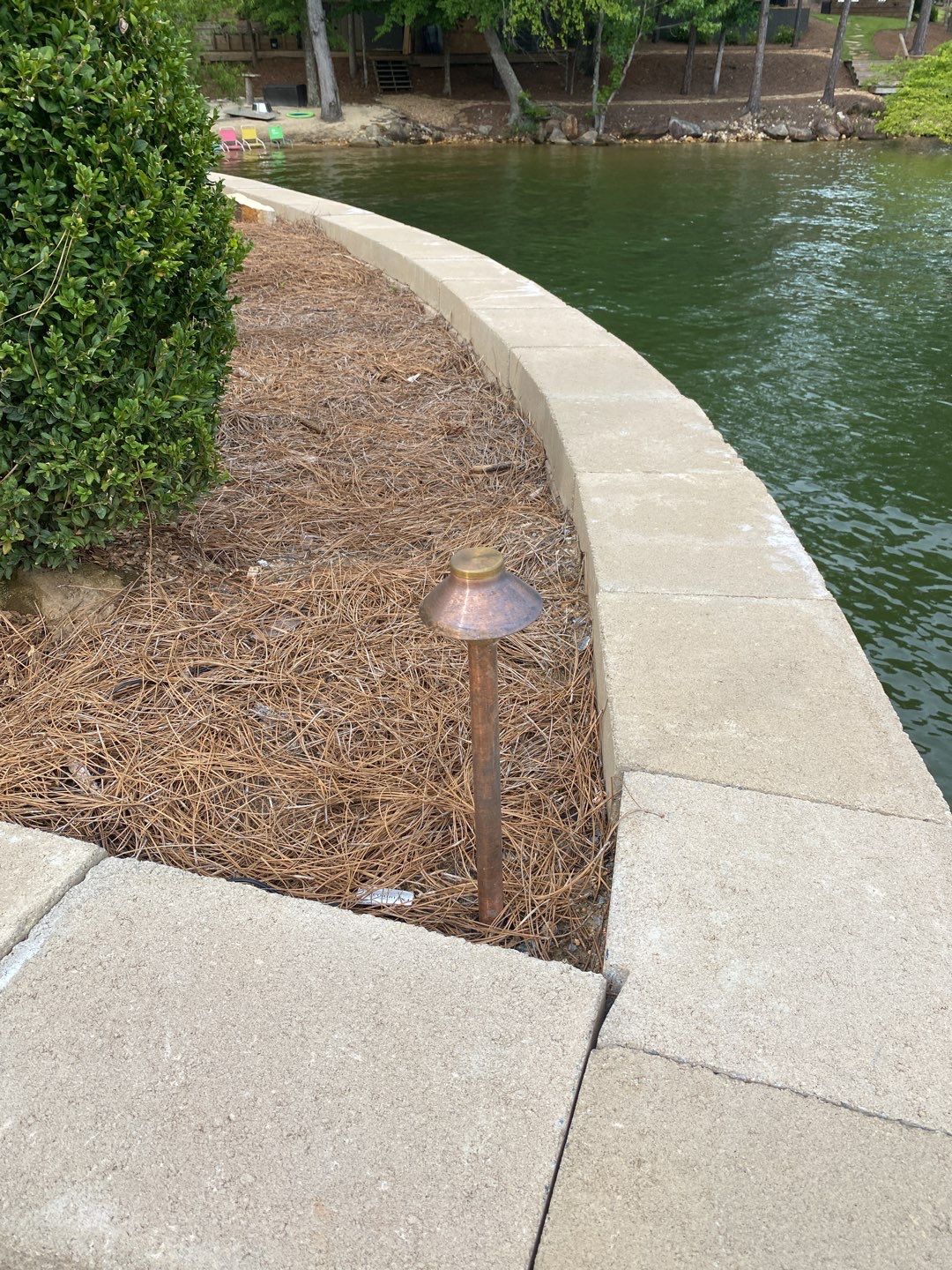 Showcasing durable waterfront lighting and careful edging, C&T Electric LLC enhances lakeside safety and evening ambiance.