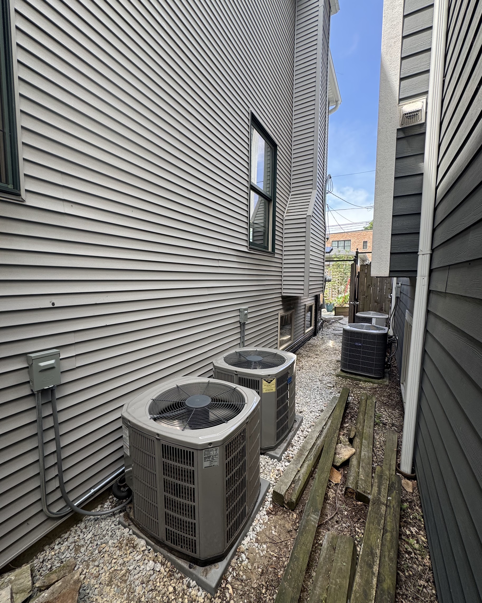 Clean, accessible outdoor installations show how Oasis Heating and Cooling delivers reliable HVAC service with careful, long-lasting placement.