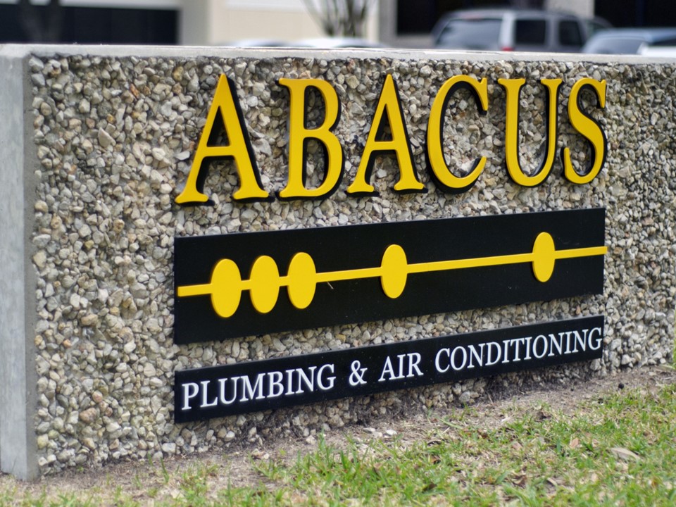 A crisp, professional sign showcases Abacus Plumbing, Air Conditioning & Electrical, signaling trusted craftsmanship and dependable local service.