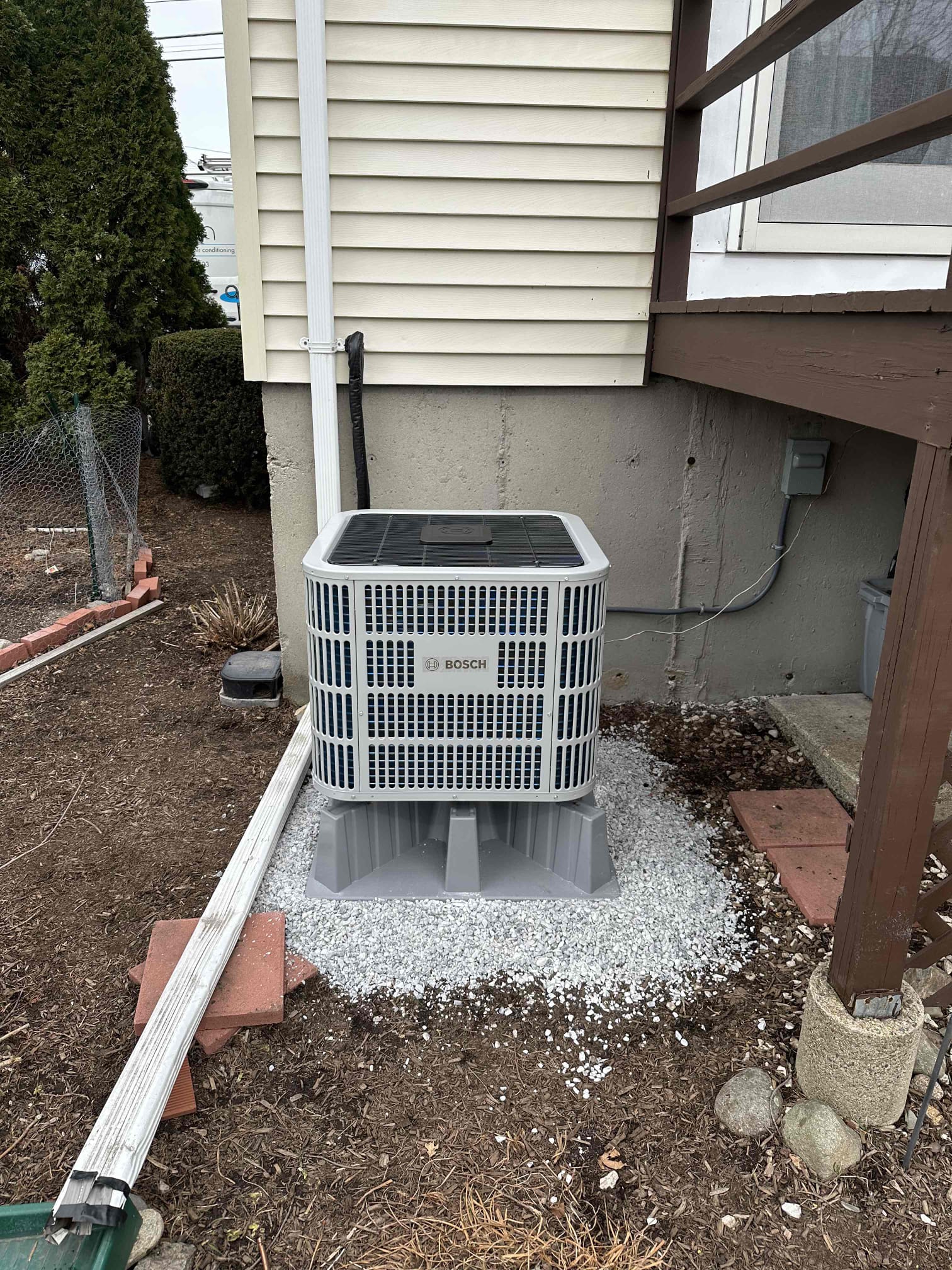 Akian Plumbing, Heating, Cooling & Electric installed this Bosch outdoor unit on a tidy gravel pad, showcasing careful workmanship and lasting reliability.