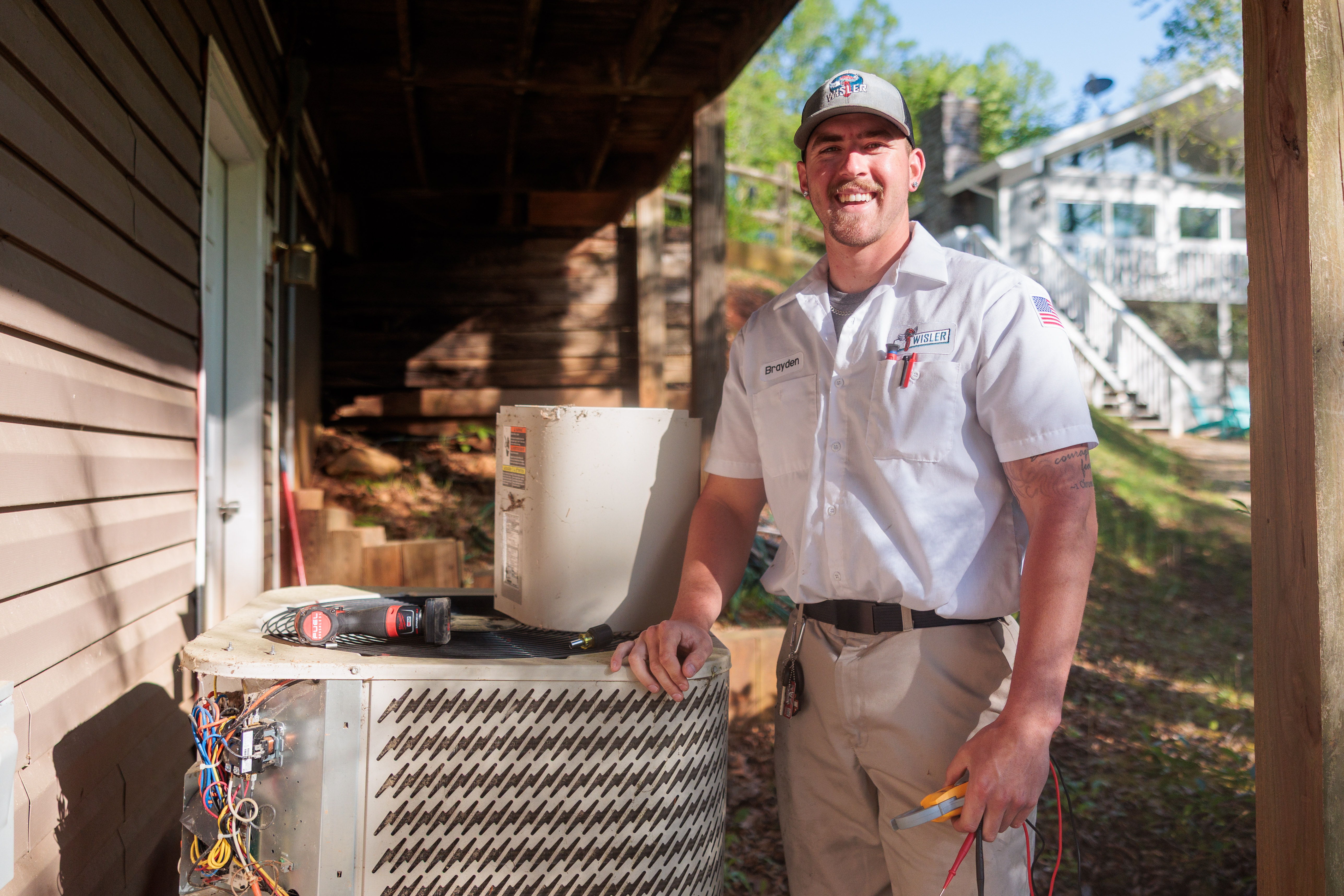 Expert HVAC services with a smile from Wisler Plumbing, Heating, Cooling, and Electrical.