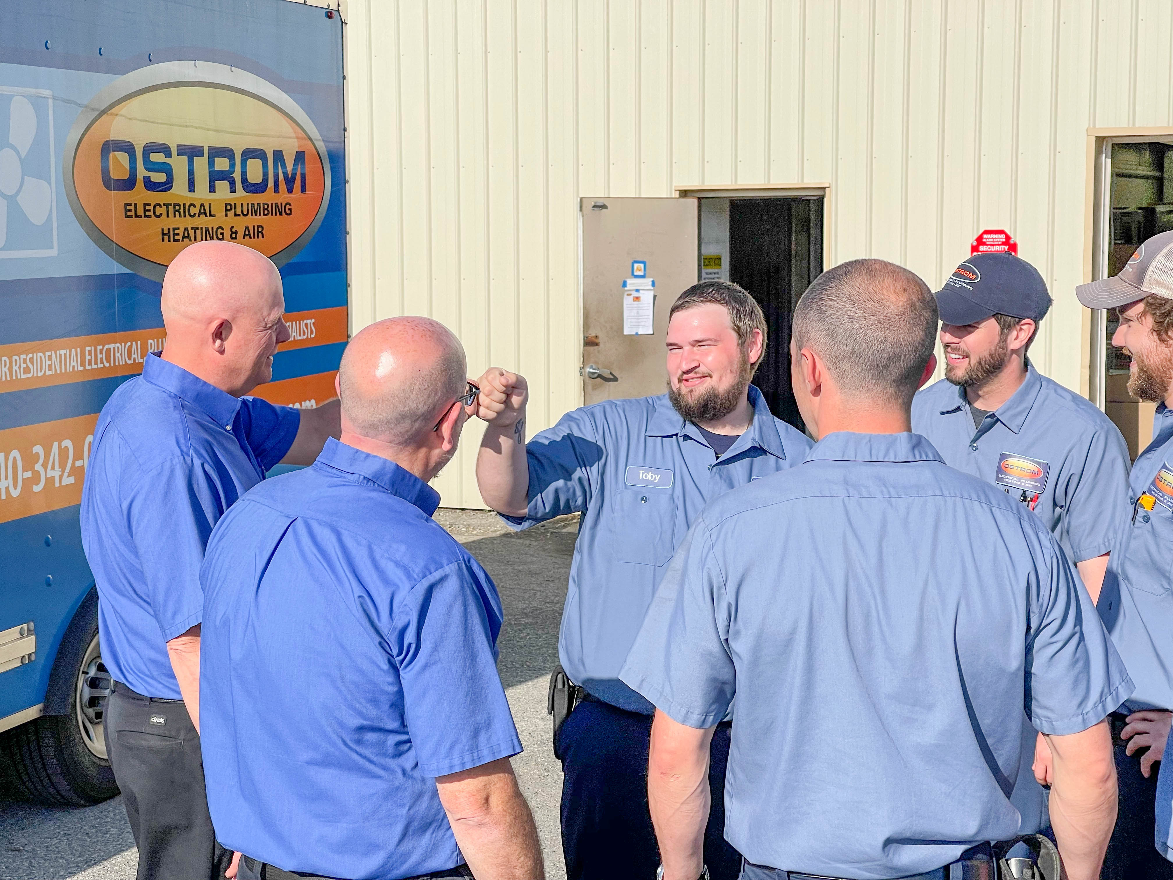 Experience seamless service with Ostrom Electrical Plumbing Heating & Air Conditioning's professional team!