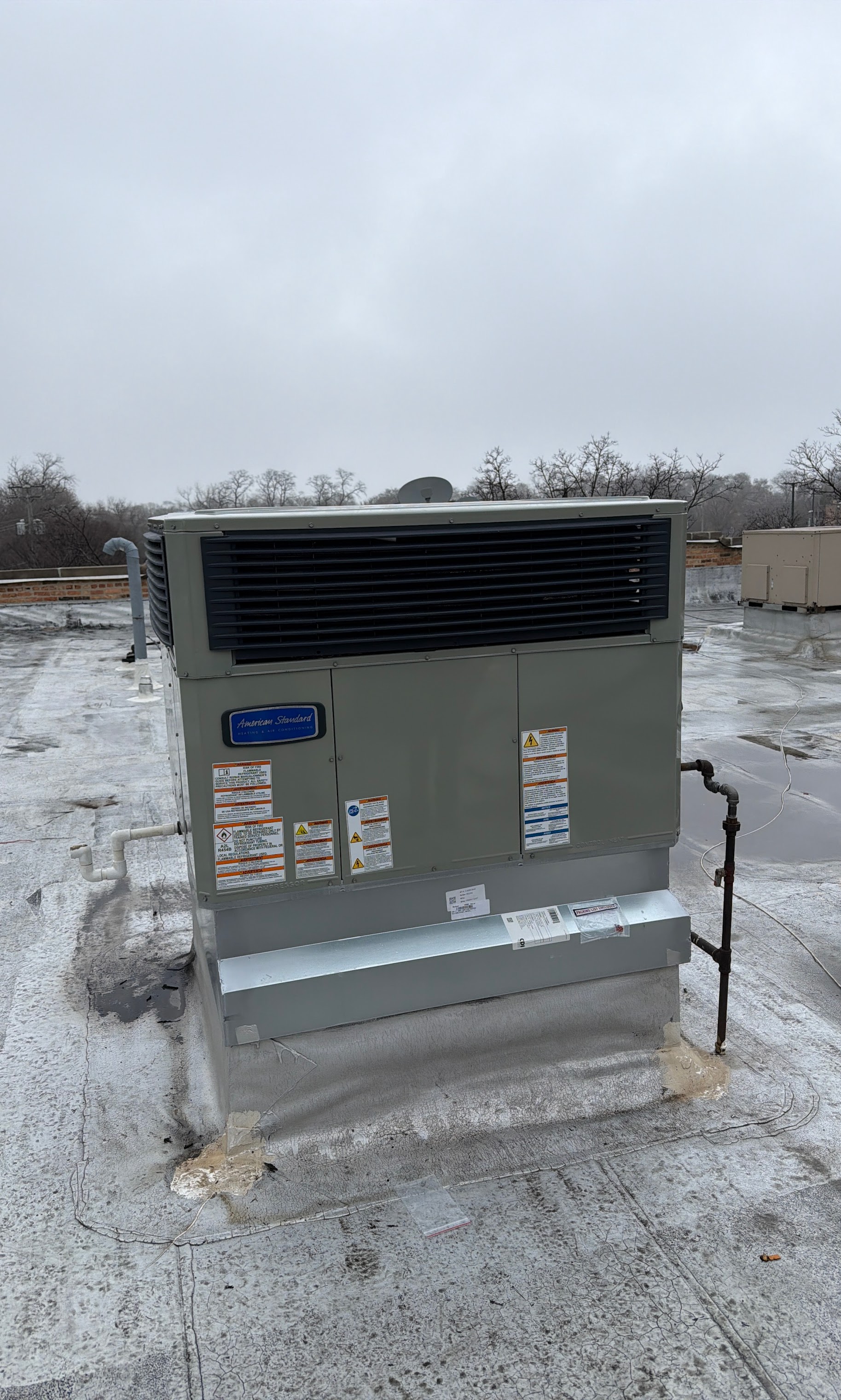 Reliable rooftop HVAC service you can trust, Oasis Heating and Cooling ensures clean, professional installations that protect your building.