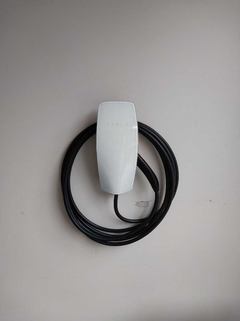 Enhance your electric vehicle experience with professional Tesla charger installations by Aardvark Electric, Inc.