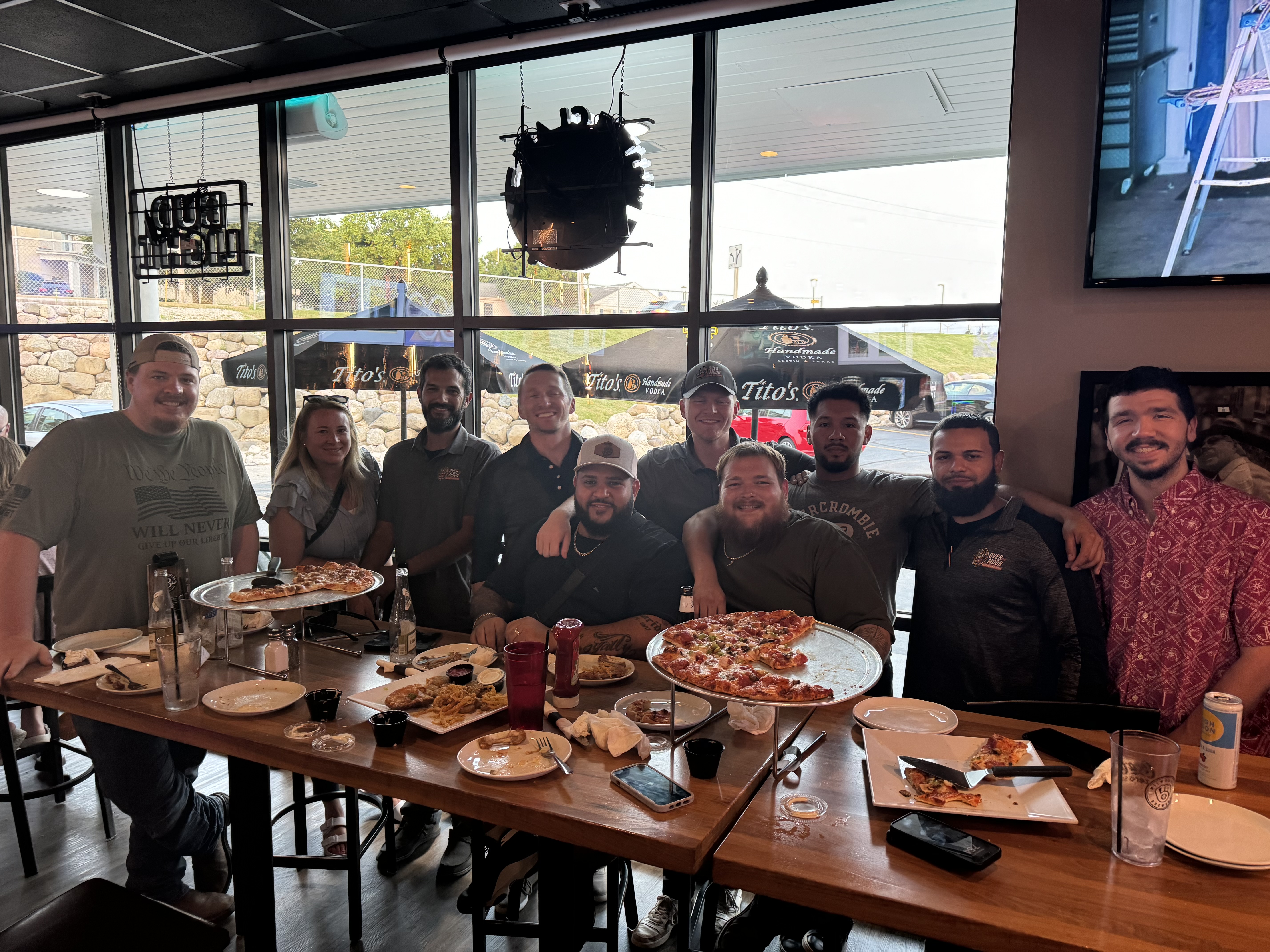 Enjoy friendly team vibes and great moments over pizza with Over the Moon!