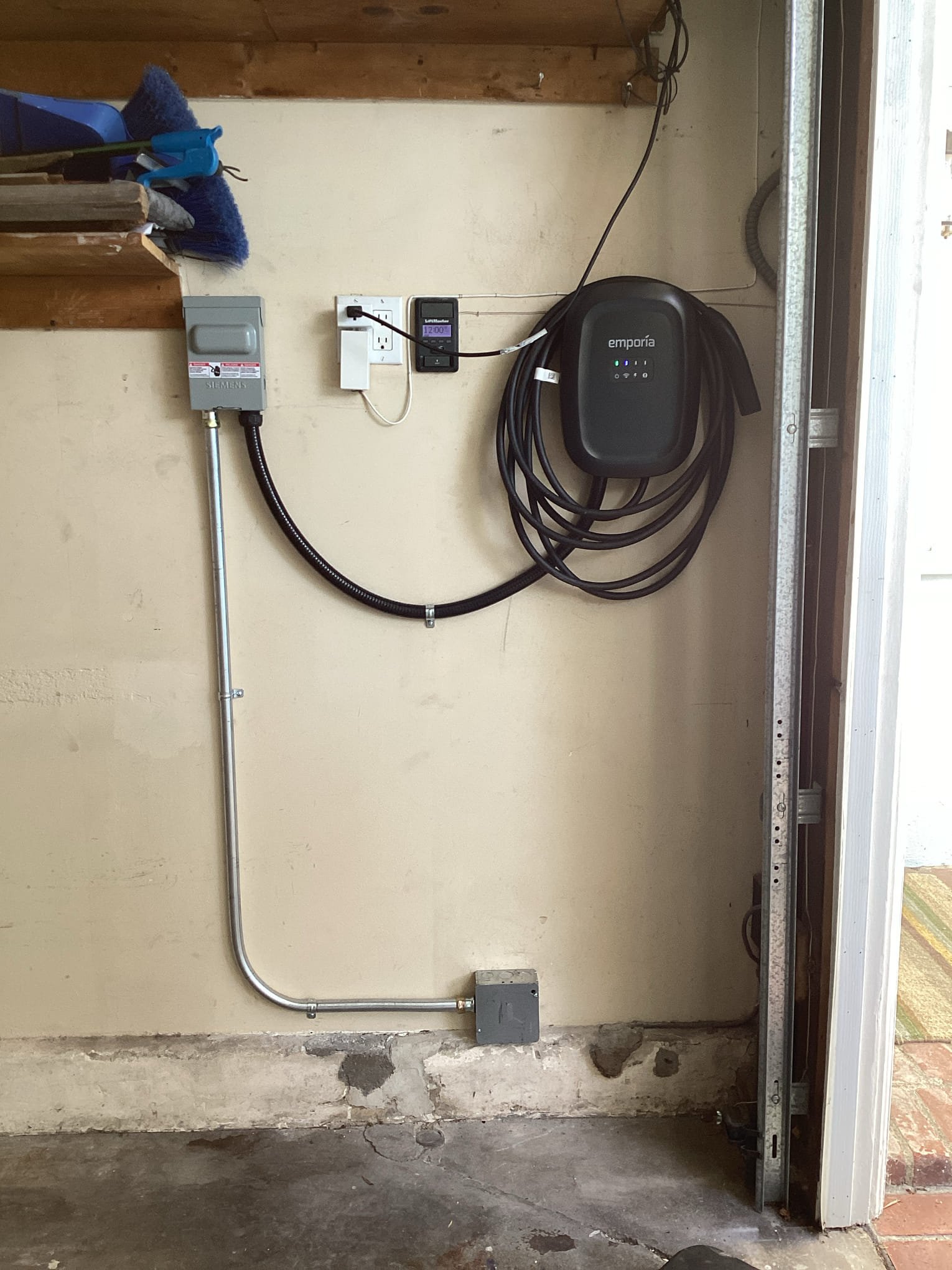 Powell Electric installed a clean, code-conscious EV charging solution in this garage to deliver reliable, convenient home charging.