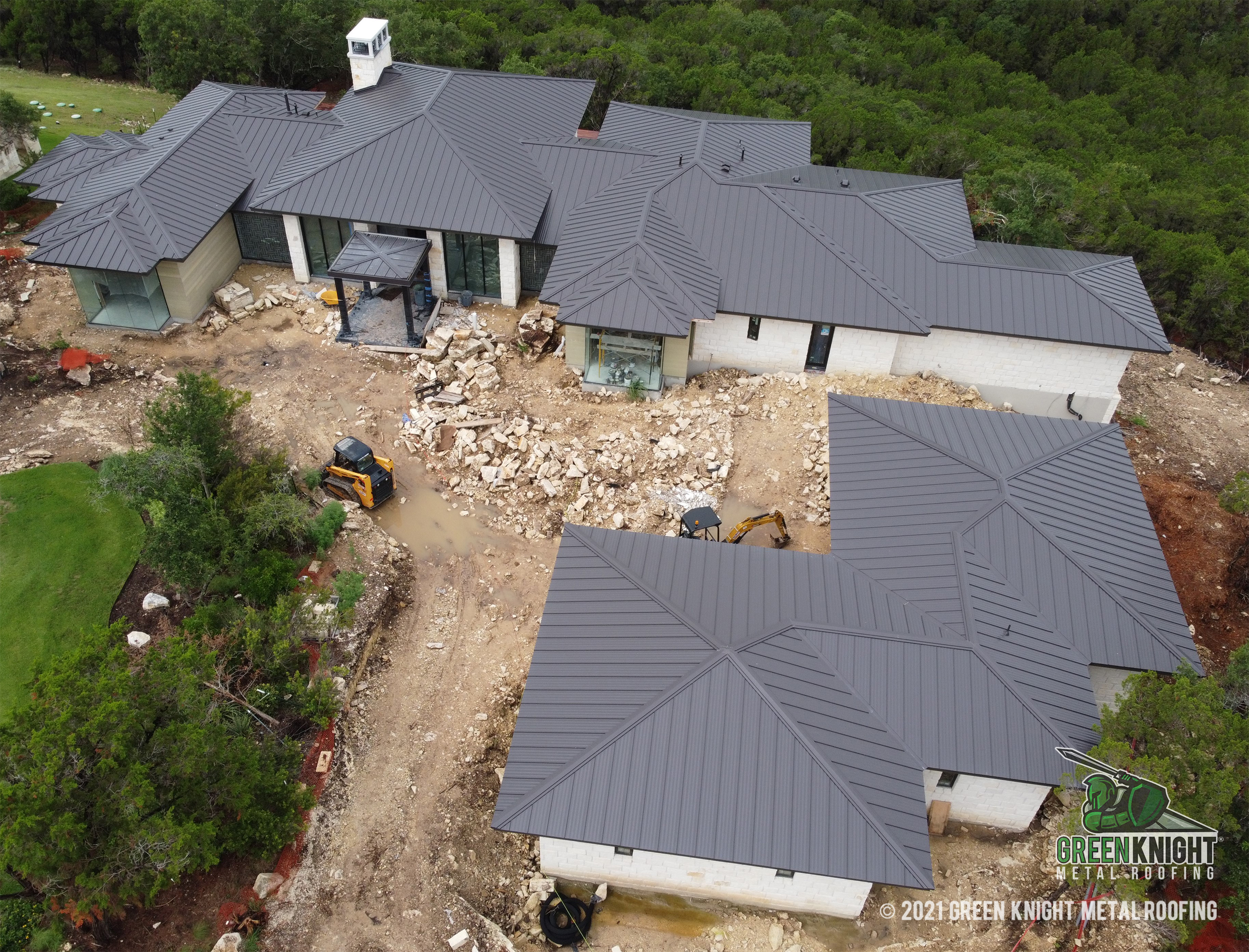 Green Knight® Metal Roofing elevates home aesthetics with expertly installed, high-quality metal roofing that blends seamlessly with the lush surroundings.