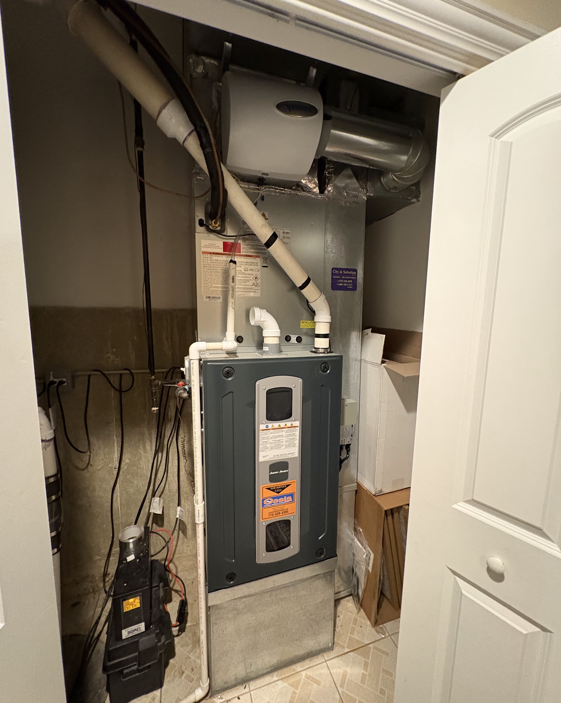 A clean, well-installed air handler and drain system show the reliable craftsmanship homeowners trust from Oasis Heating and Cooling.