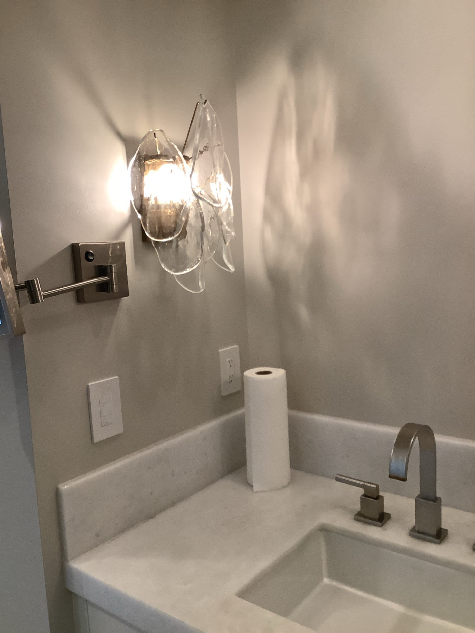 Powell Electric delivered a clean, professional lighting install that enhances bathroom ambiance and highlights quality finishes.