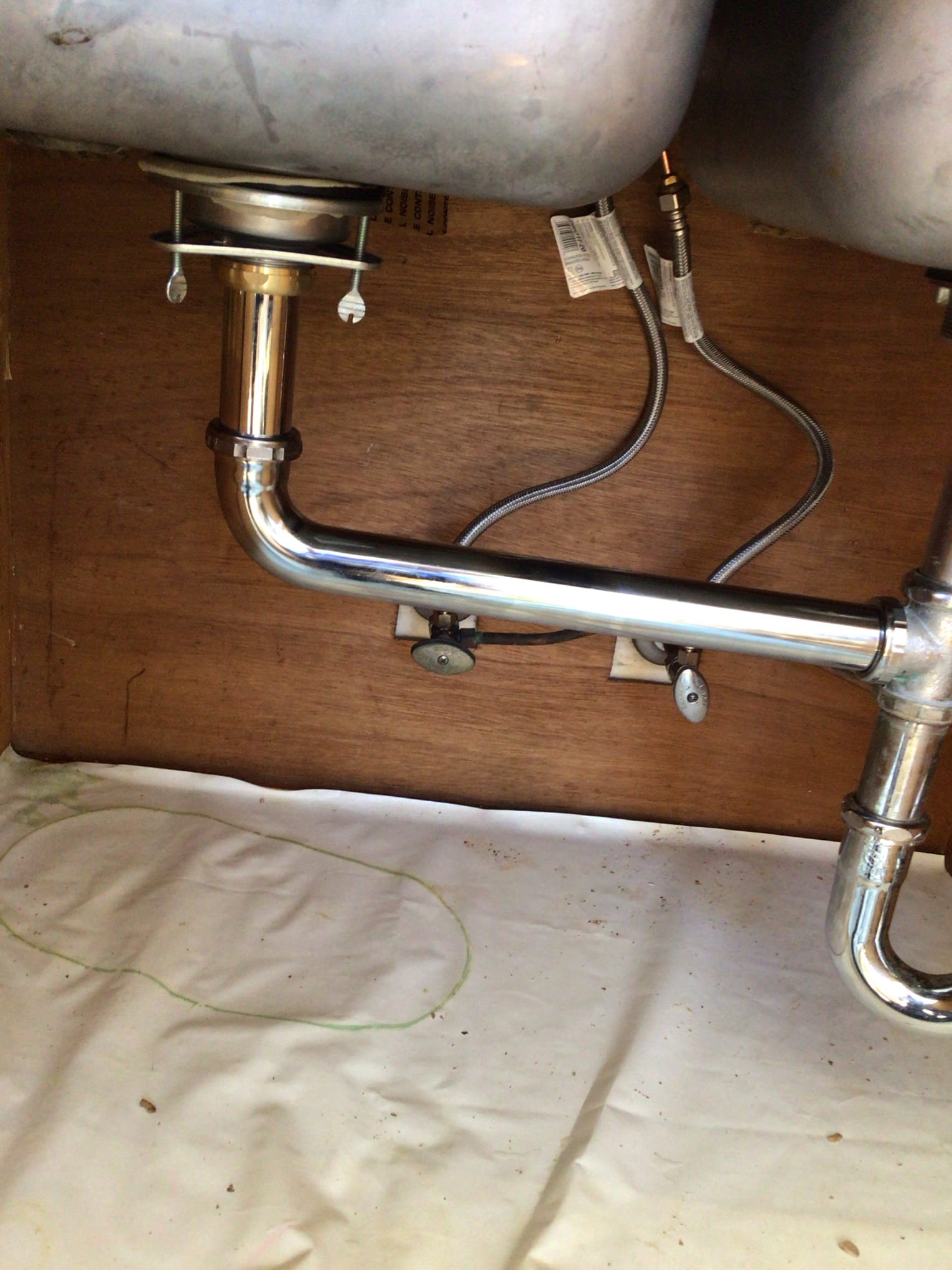 Neat chrome plumbing and accessible shutoff valves show the care and reliability customers expect from Magic Plumbing Heating & Cooling.